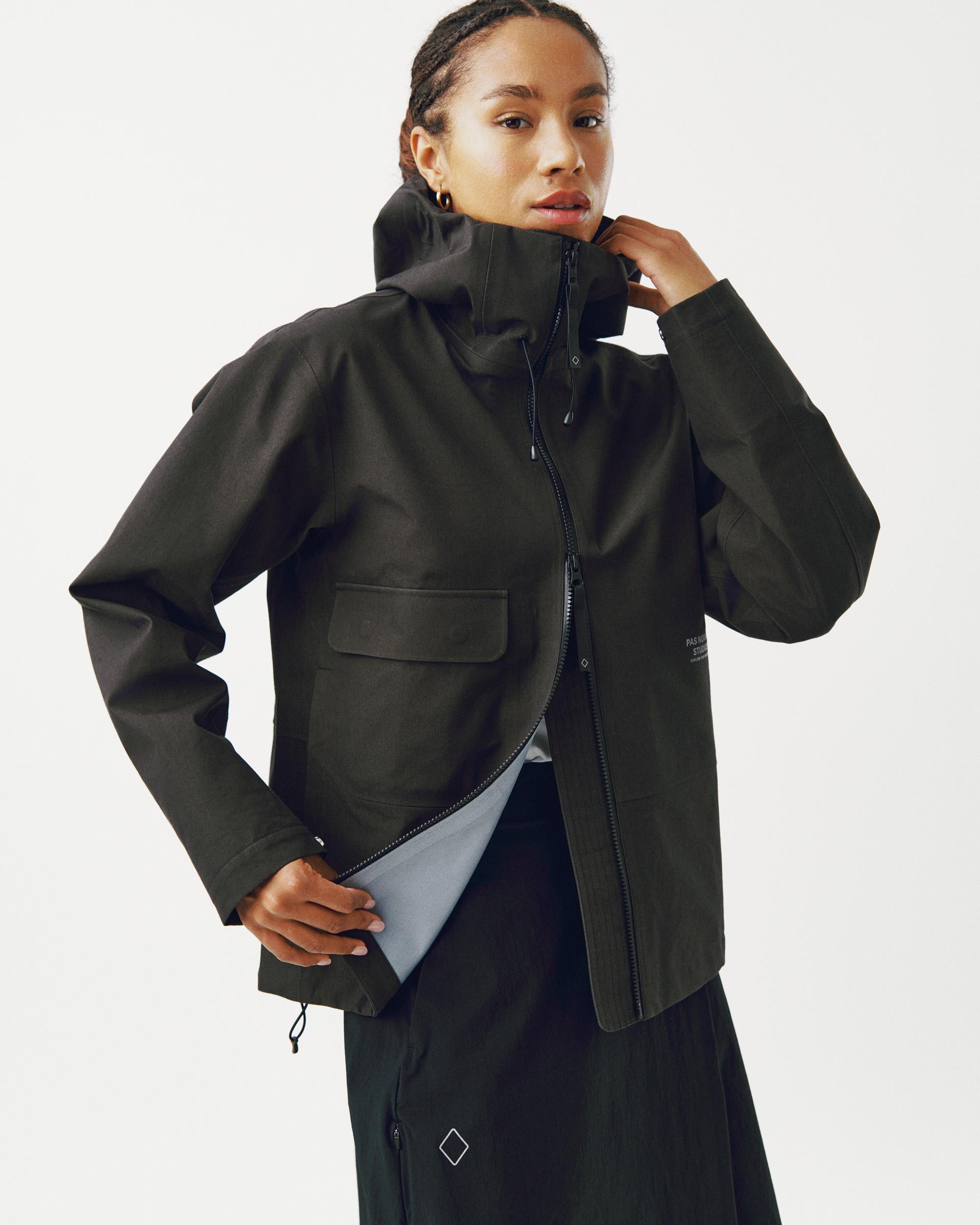 Dark Olive Off-Race 3L Cotton Shell jacket on model with full zip and chest pocket