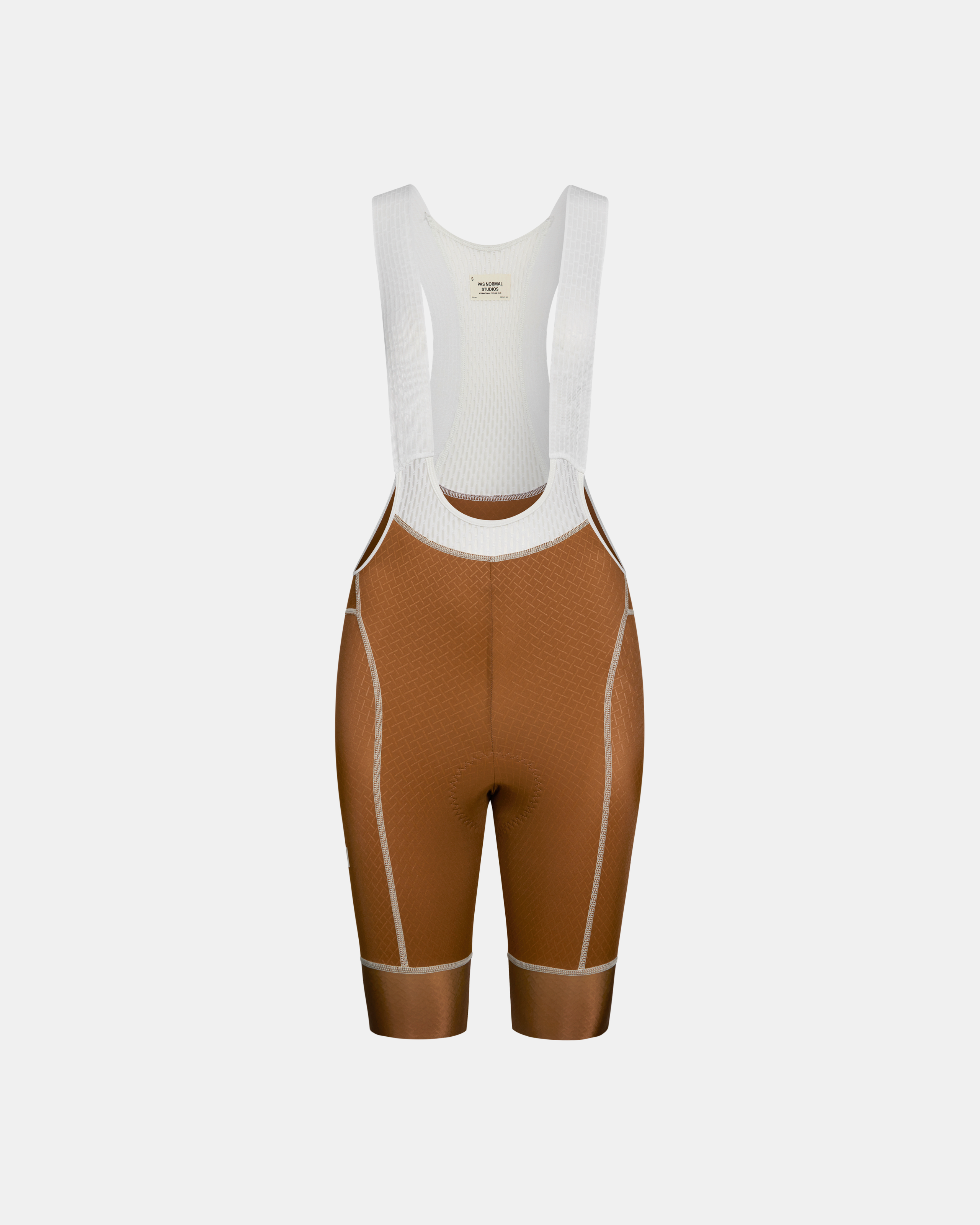 Brown Mechanism cycling bibs, front flat lay with white mesh bib straps