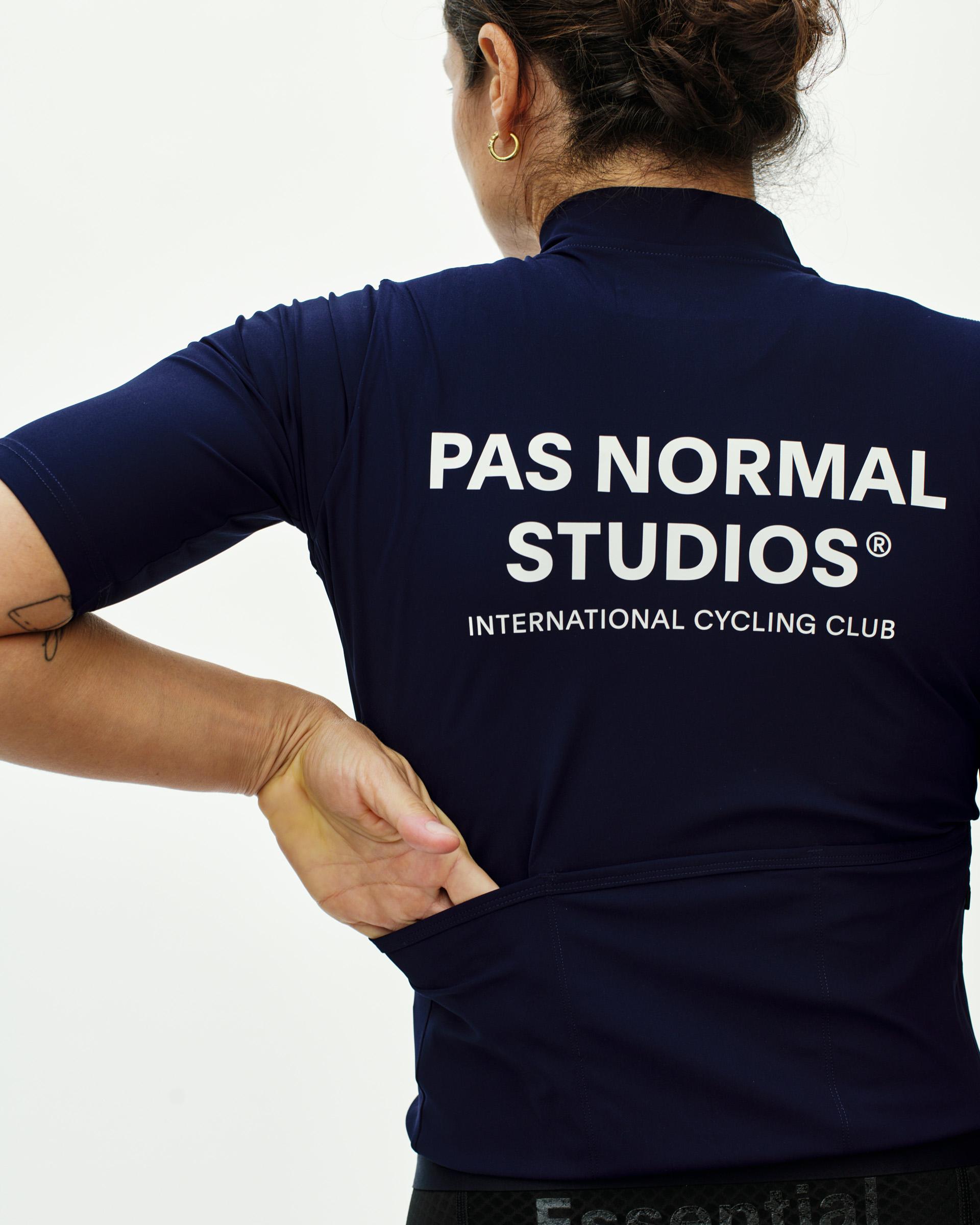 Navy Essential cycling jersey, rear on model with white back print