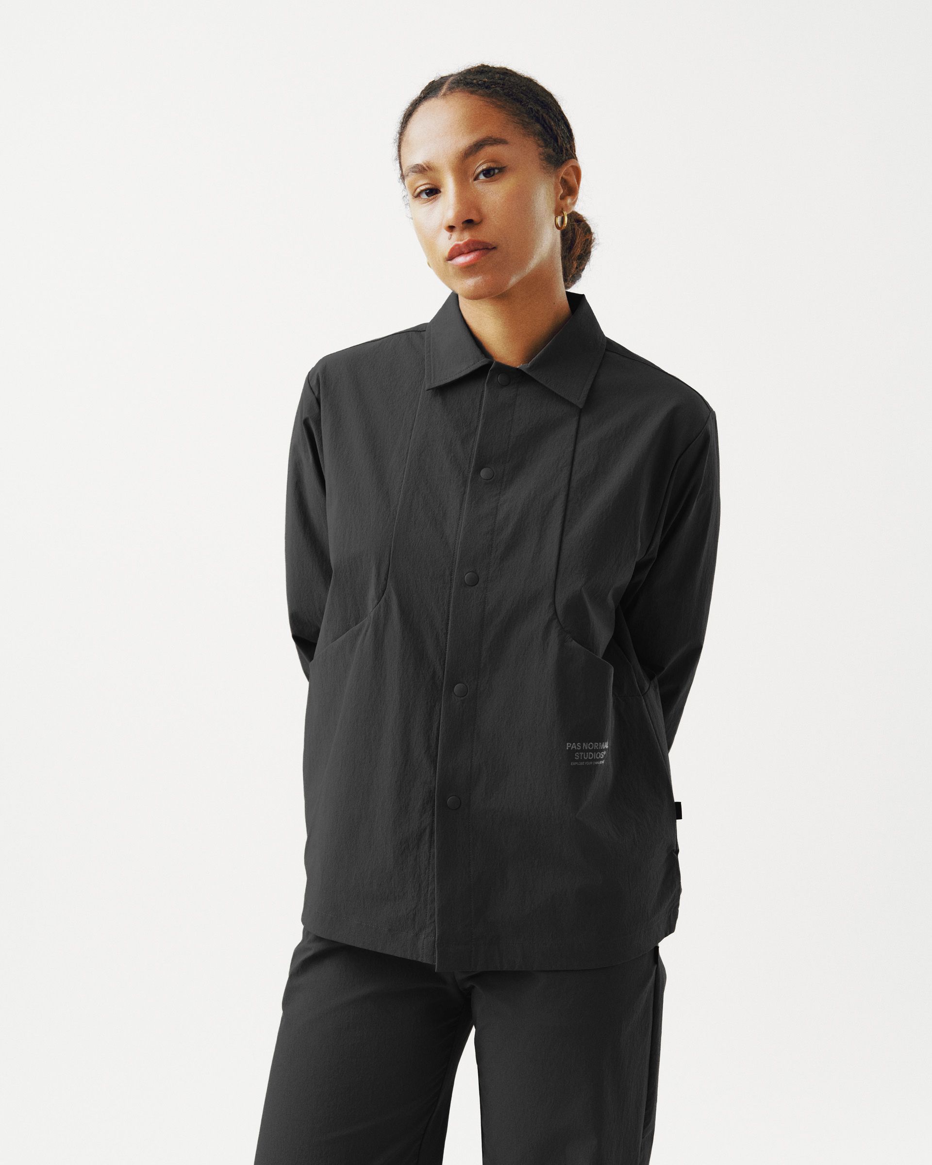 Black Off-Race Tech Overshirt on model with button front and chest patch detail