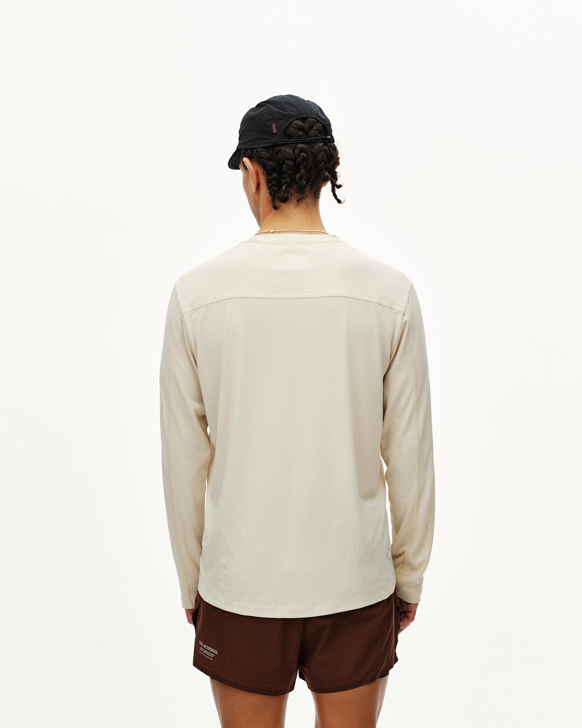 Sand Balance long sleeve T-shirt on model, rear view with contrast upper back panel