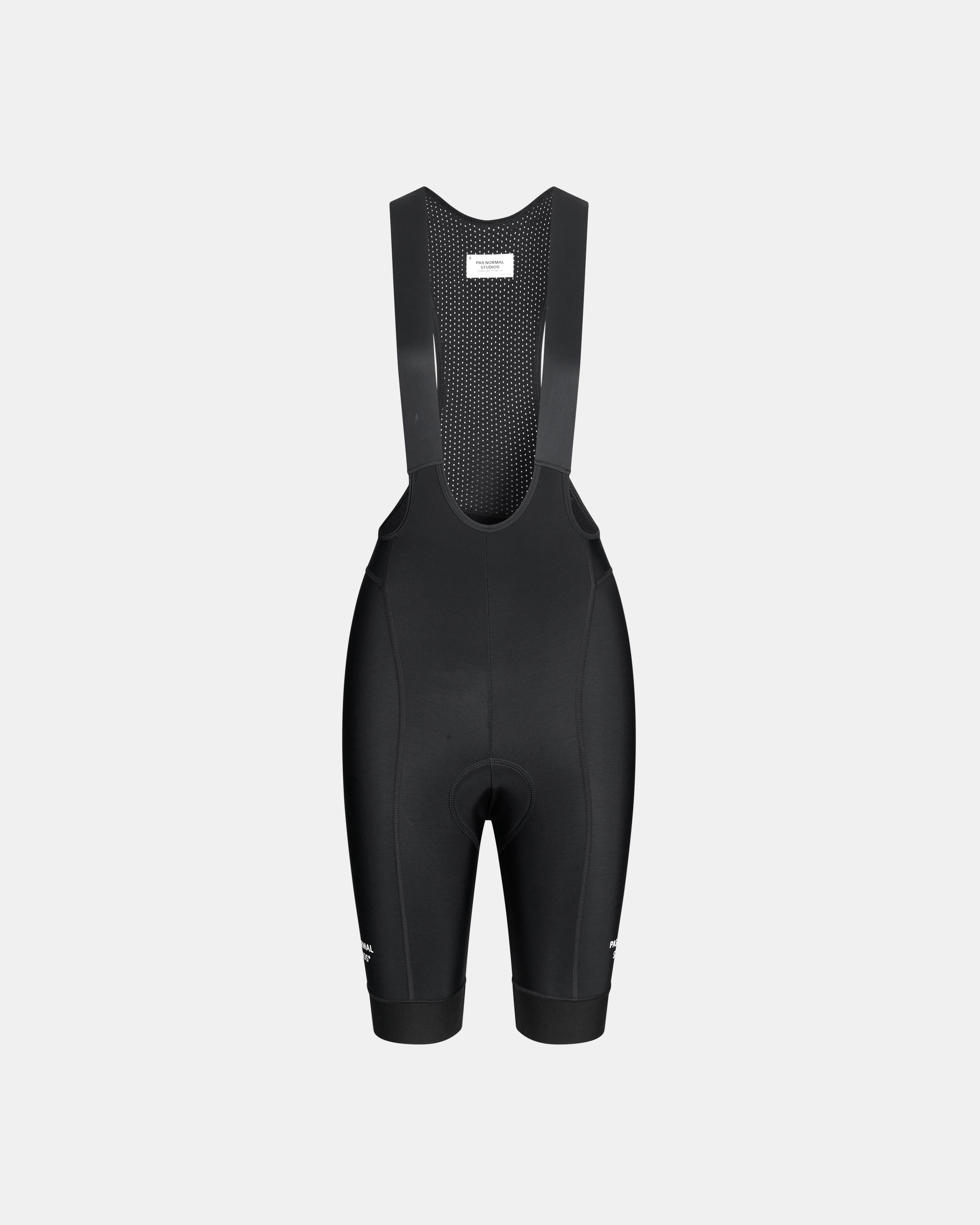 Black Essential Thermal cycling bibs, front flat lay with mesh panel bib and white chest label