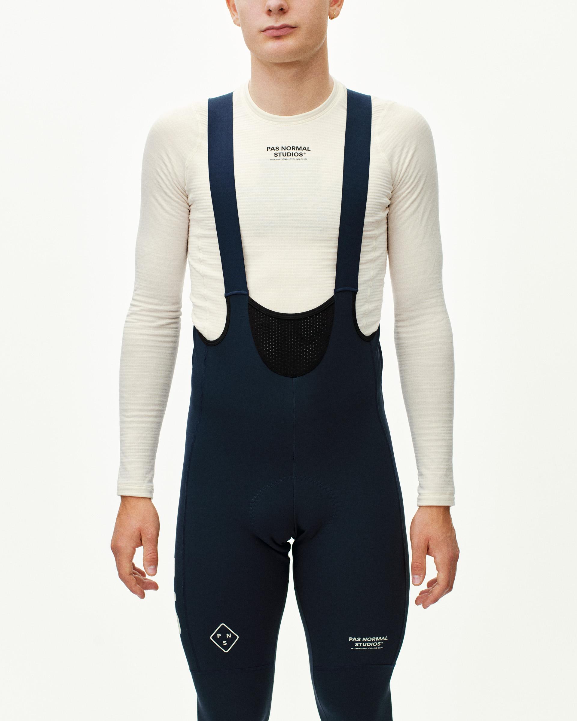 Navy PAS Mechanism Deep Winter Long cycling bibs on model, front view with mesh bib panel