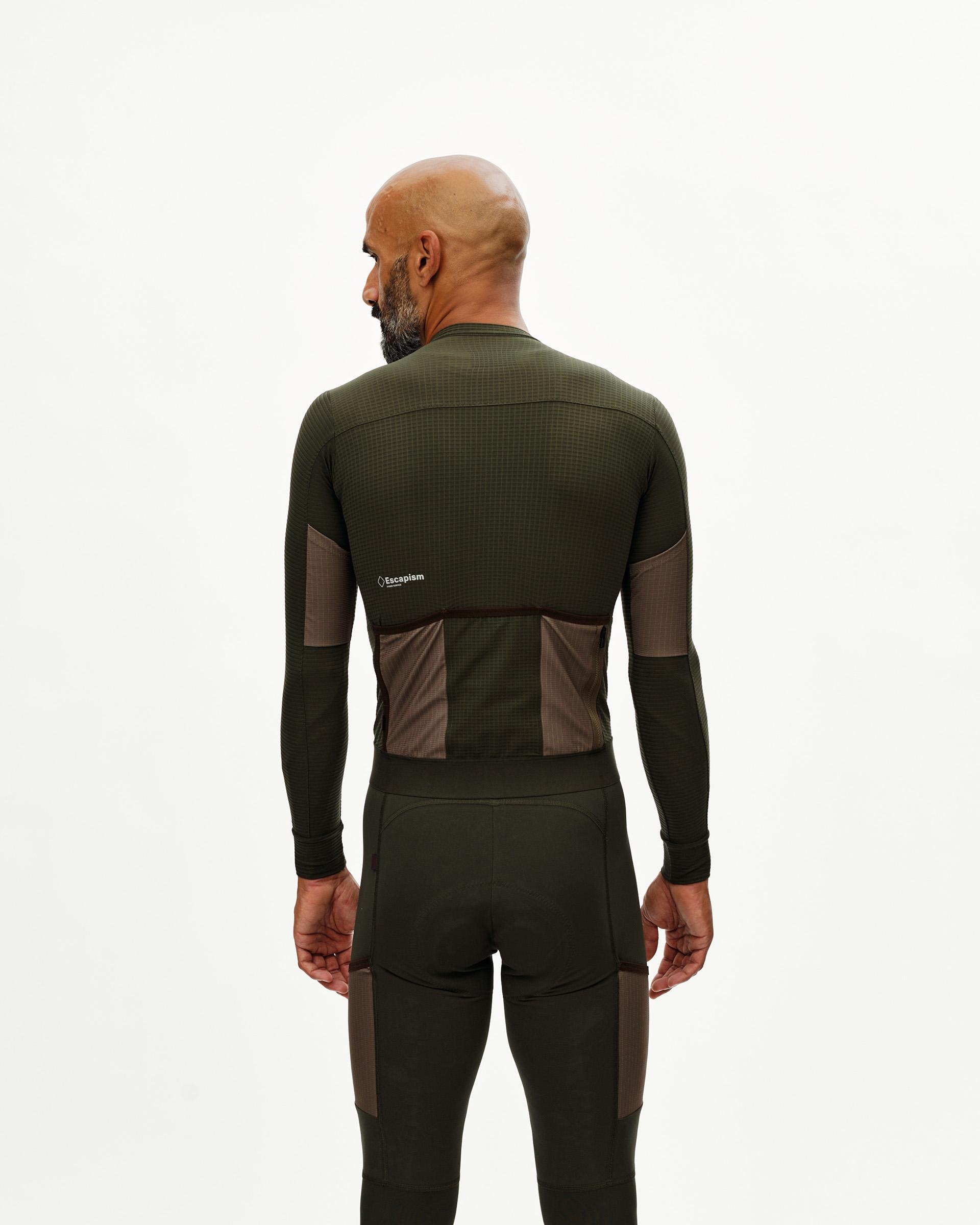 Dark Olive Escapism long sleeve cycling jersey on model, rear view with ripstop panels and back pockets