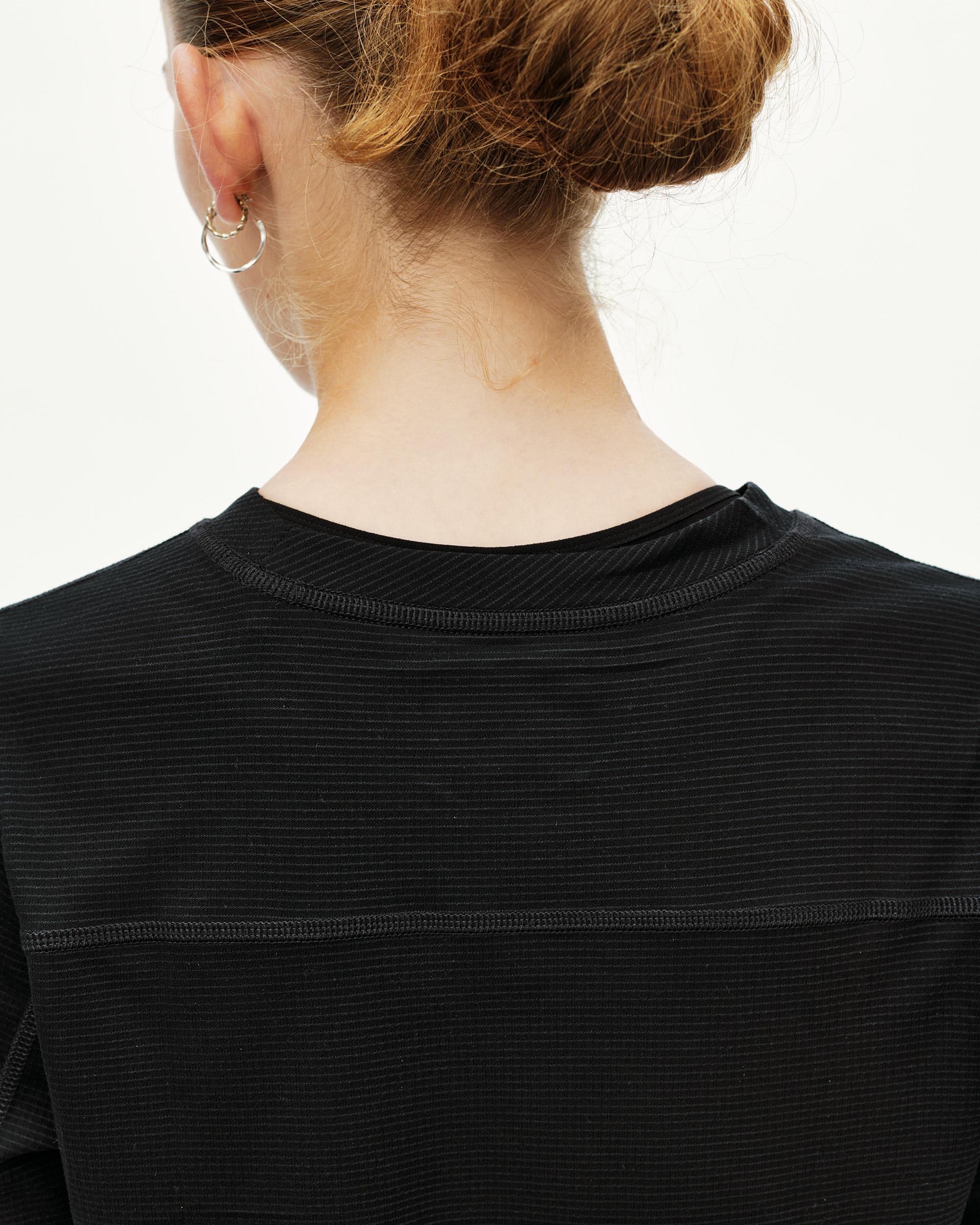 Black Balance long sleeve T-shirt, rear detail on model with ribbed texture and contrast back seam