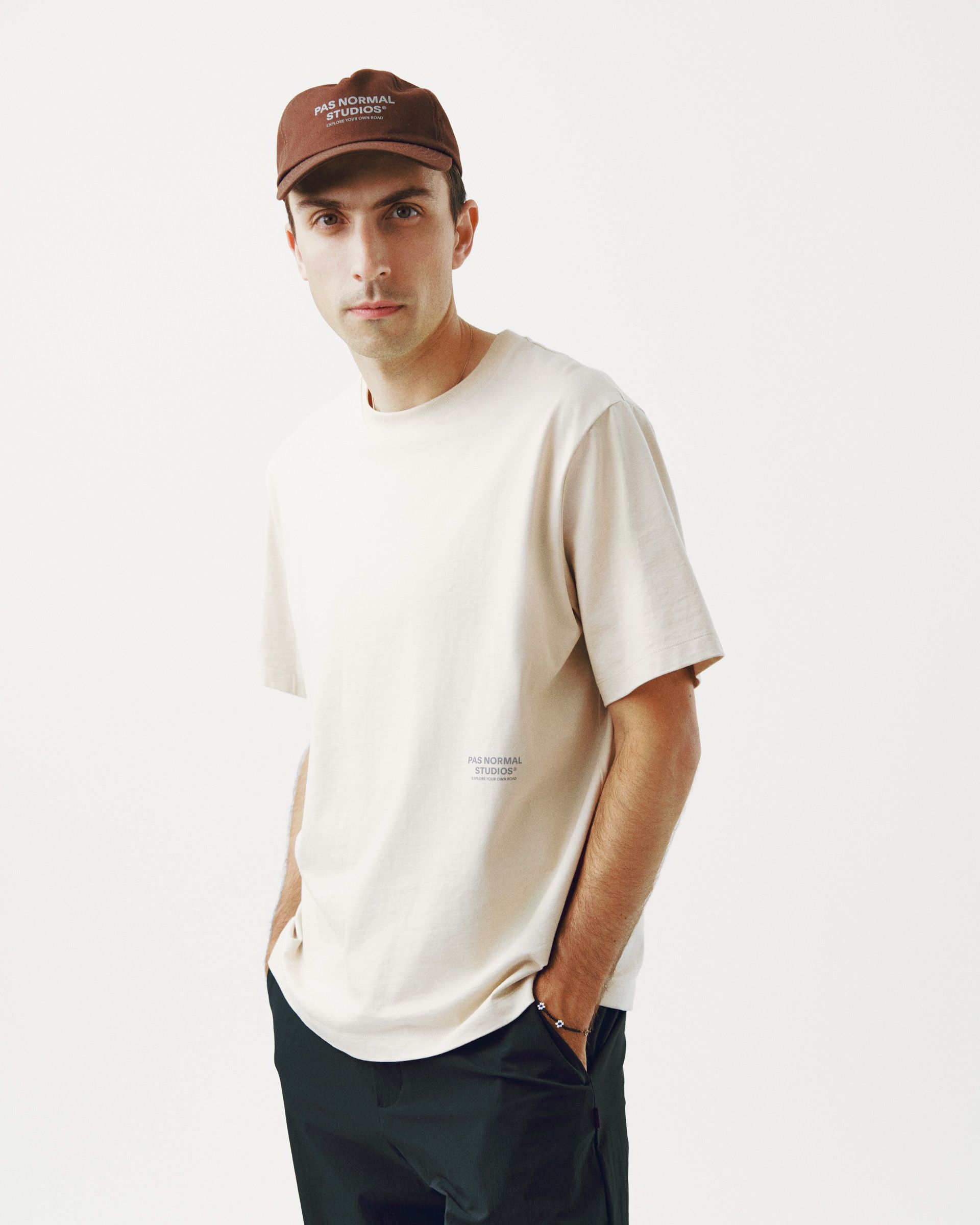 Bone Off-Race t-shirt on model with small chest logo