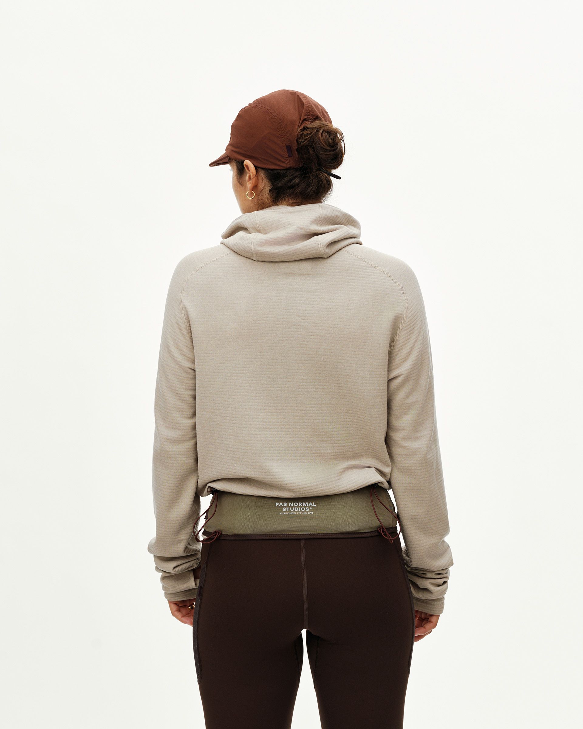 Light Brown Salomon S/LAB Belt on model, rear view with olive waistband and side lace detail