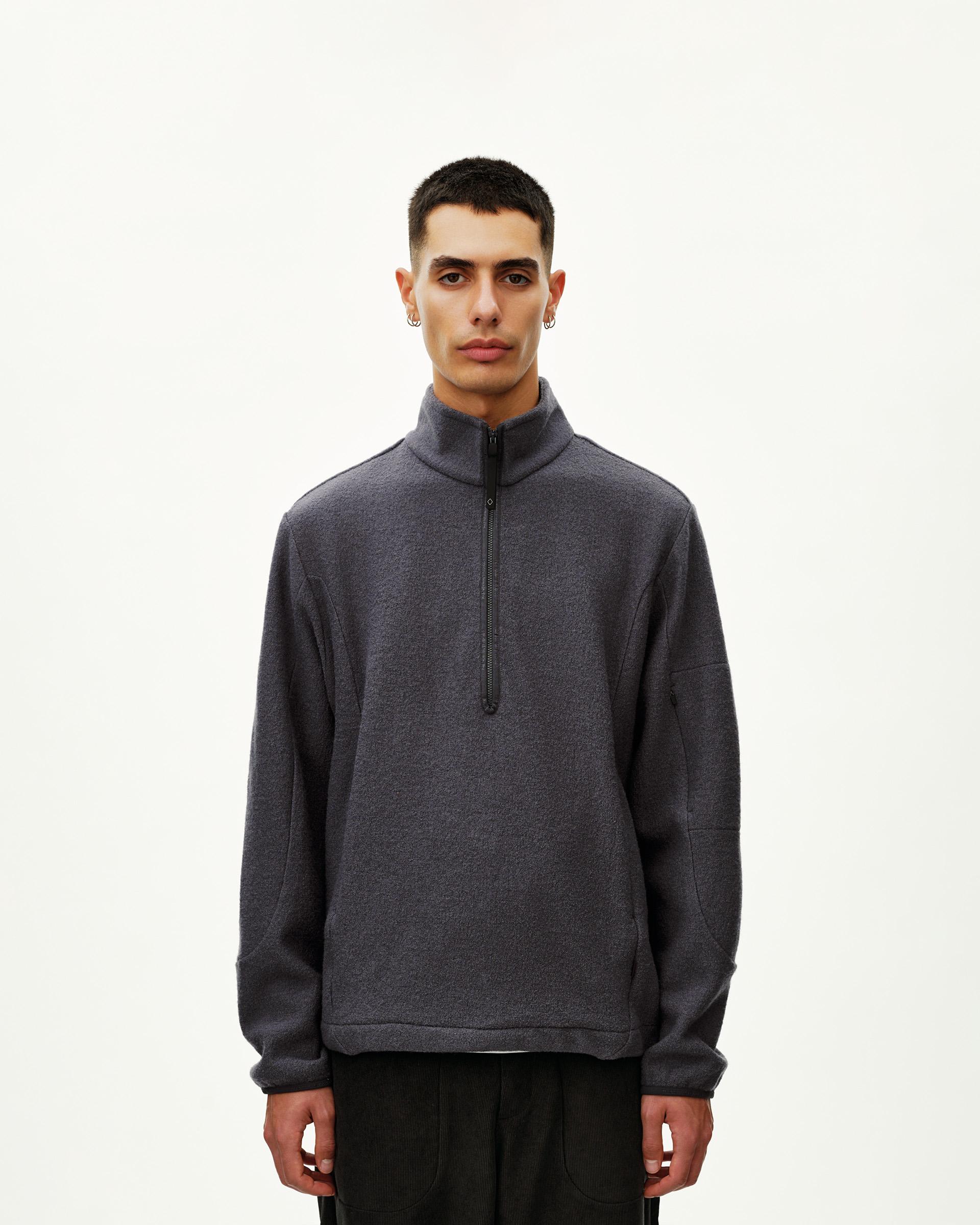 Steel grey Off-Race Boiled Wool Half-Zip outerwear on model, front view with quarter zip collar