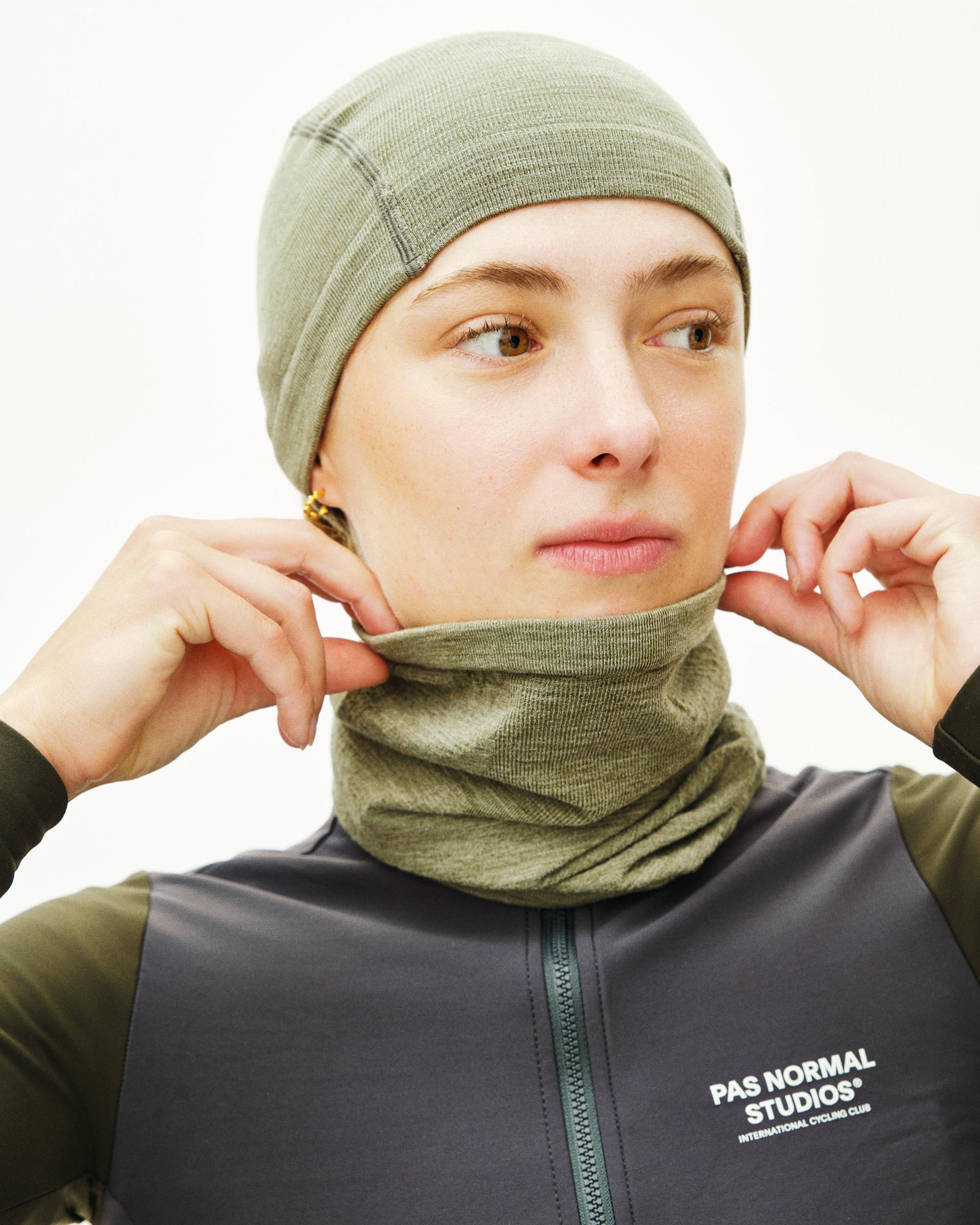 Khaki Green Logo Merino Knit necktube on model, ribbed knit texture with matching beanie