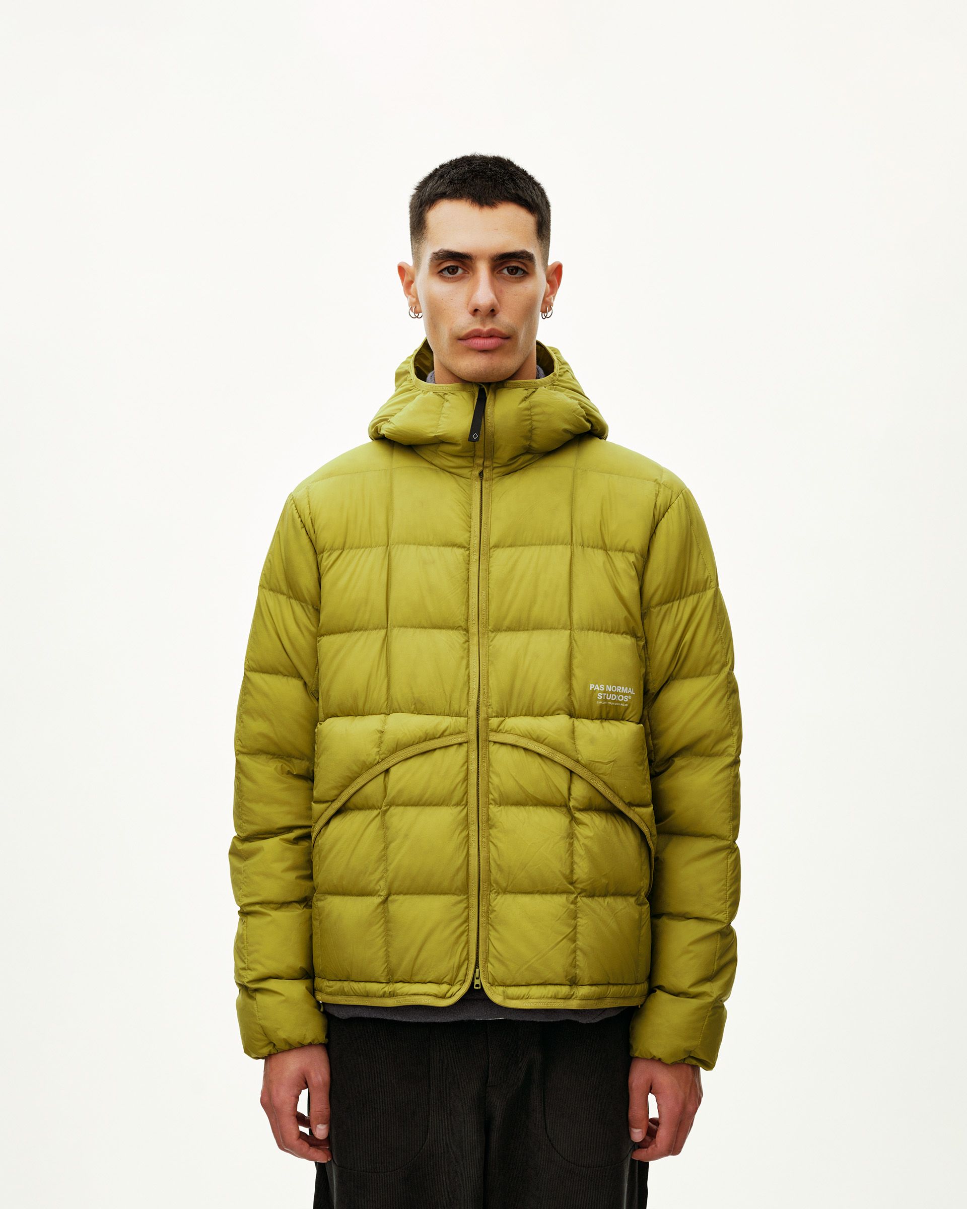 Dark Lime green Off-Race Down Liner jacket on model, front view with box quilting and hood