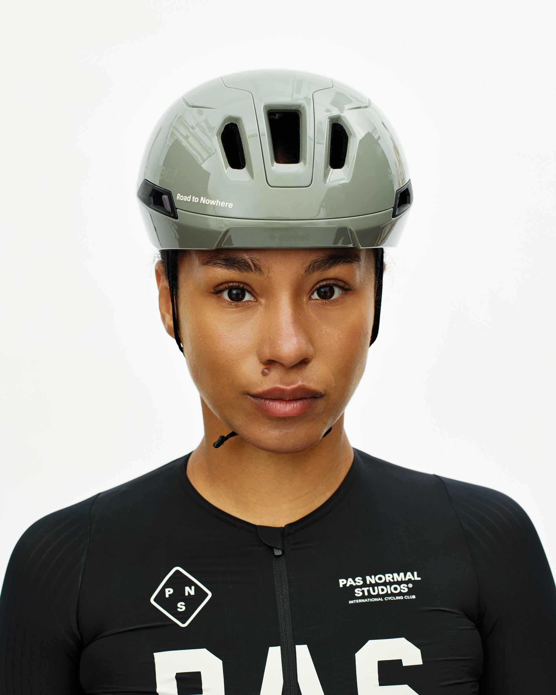 Grey PAS Tucker III 2Vi MIPS cycling helmet on model with Road to Nowhere text and ventilation ports