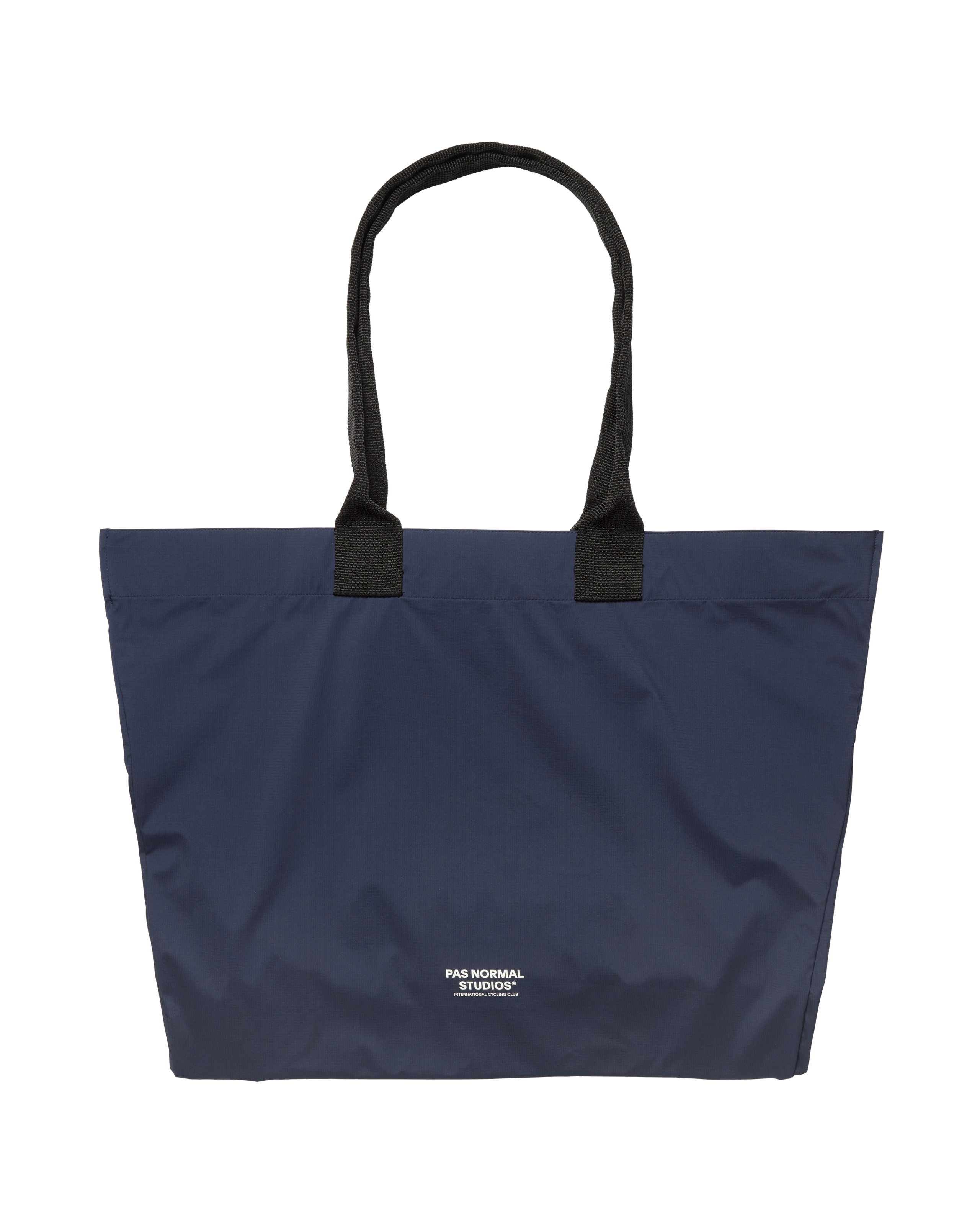 Navy Logo Shield tote bag, front view with black handles and white logo print