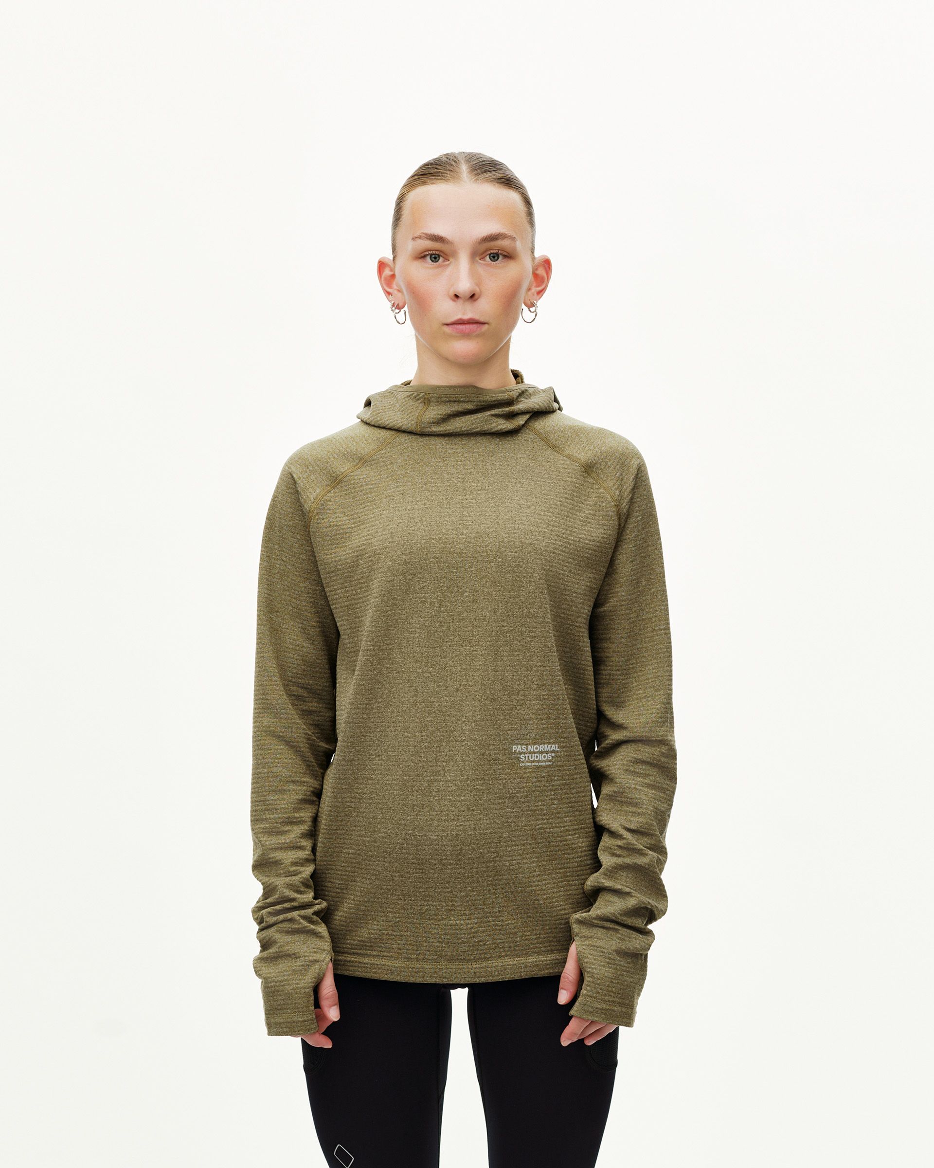 Moss Brown Balance Thermal cycling hoodie on model, front view with hood and thumbhole cuffs