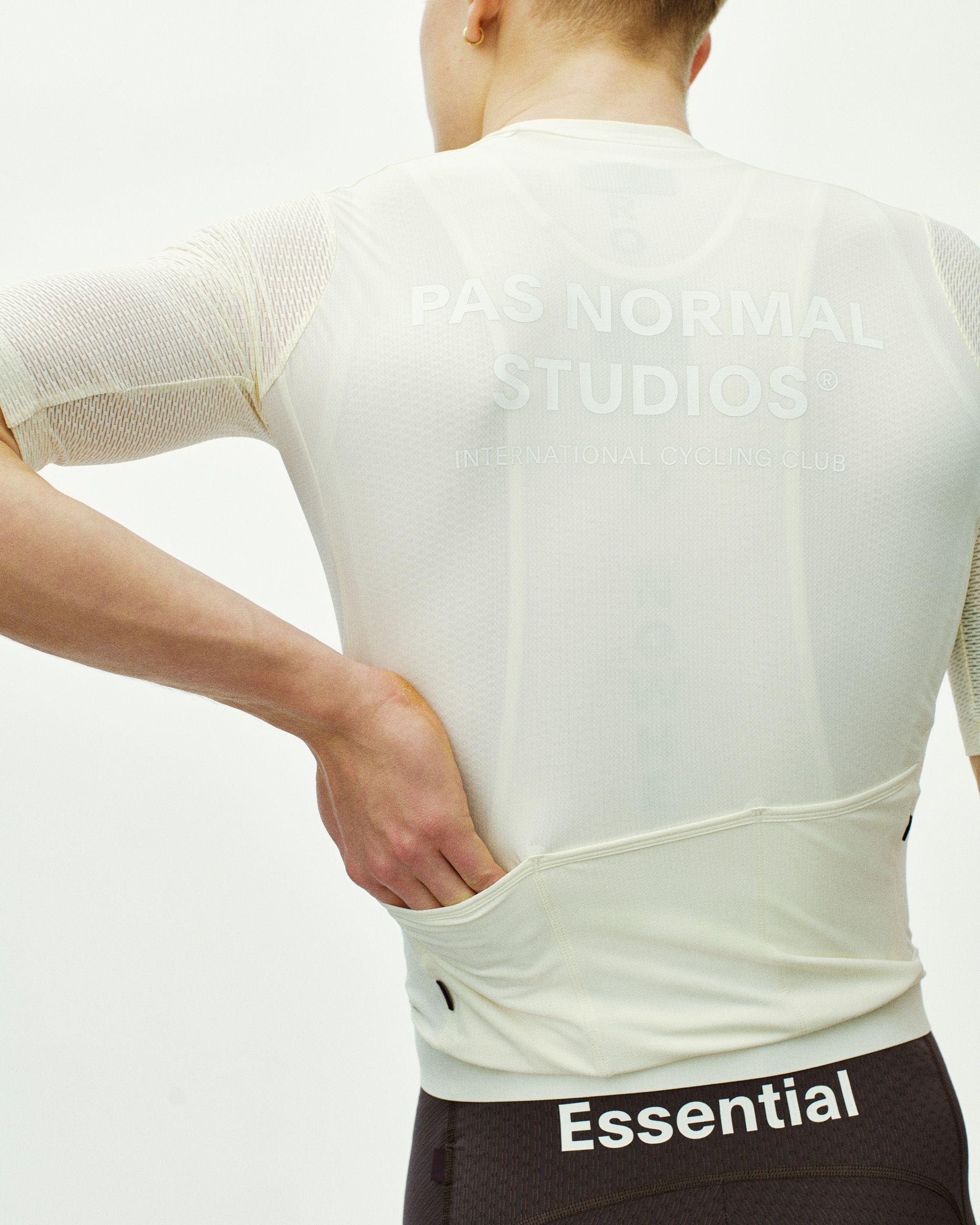 Off White Essential Light cycling jersey, rear view on model with mesh shoulder panels
