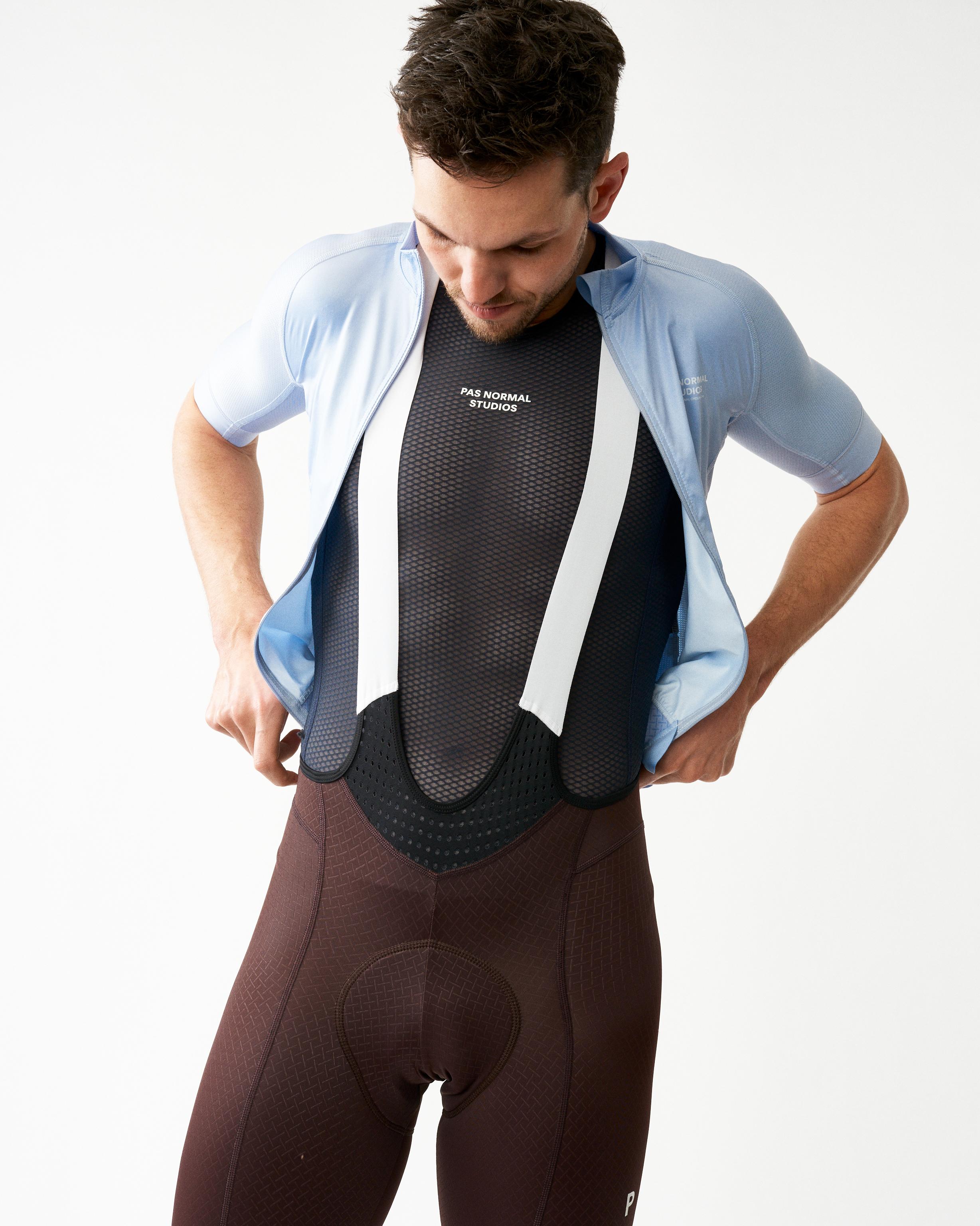 Navy Mechanism sleeveless base layer on model with mesh panel construction