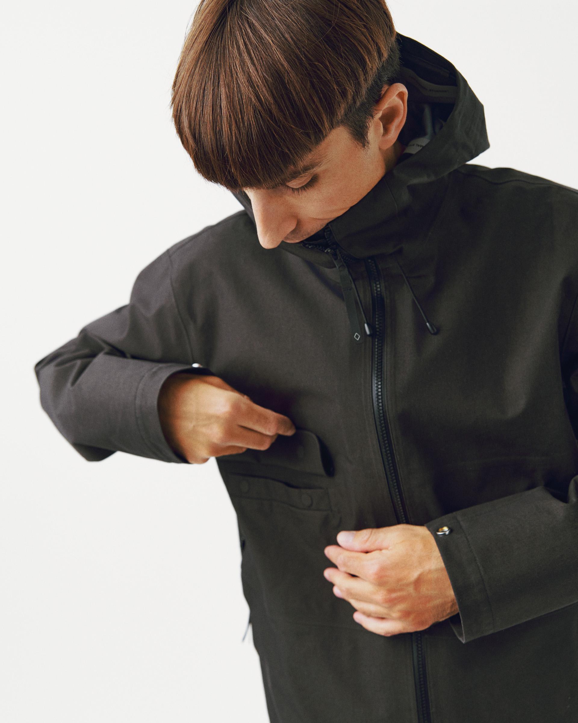 Dark Olive Off-Race 3L Cotton Shell jacket on model with hood and front zip