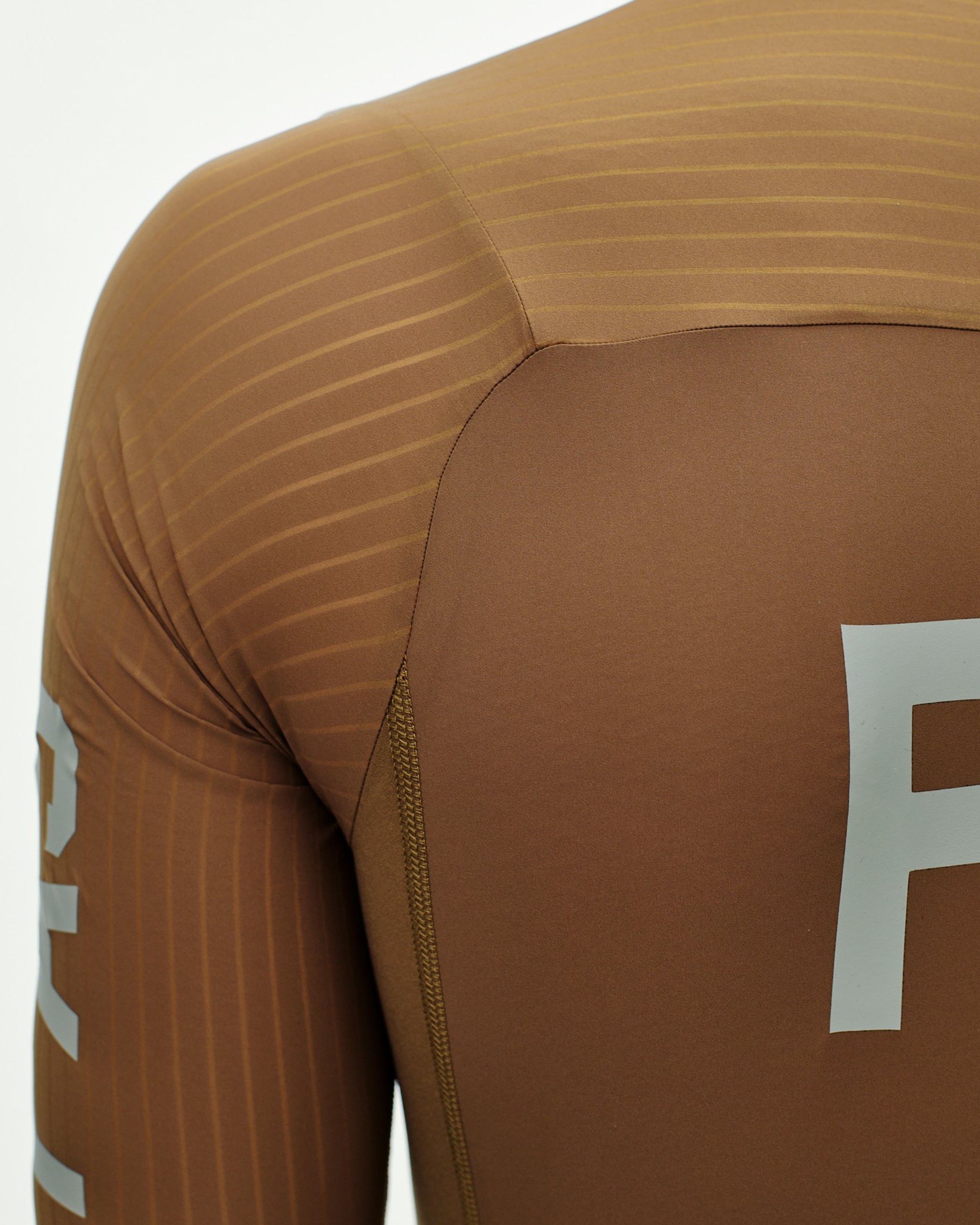 Brown PAS Mechanism Pro speedsuit, side detail view with ribbed shoulder panel