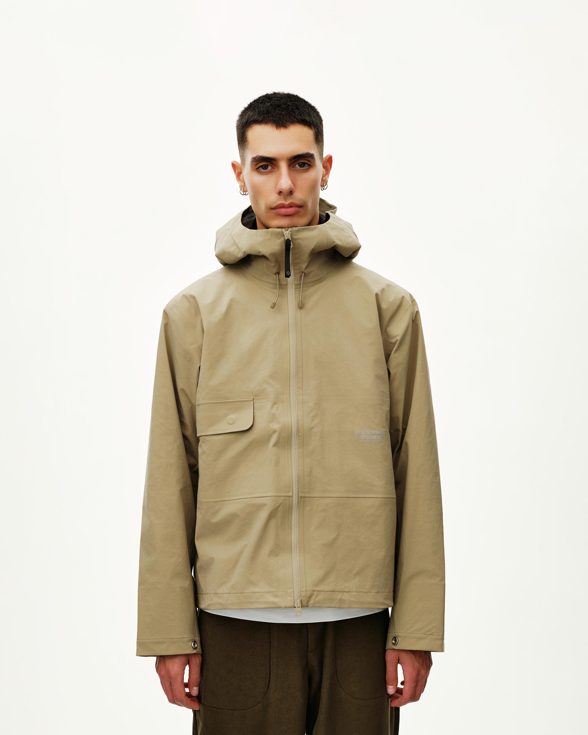 Dusty Earth khaki Off-Race 3L Shell jacket on model, front view with chest flap pocket and full zip