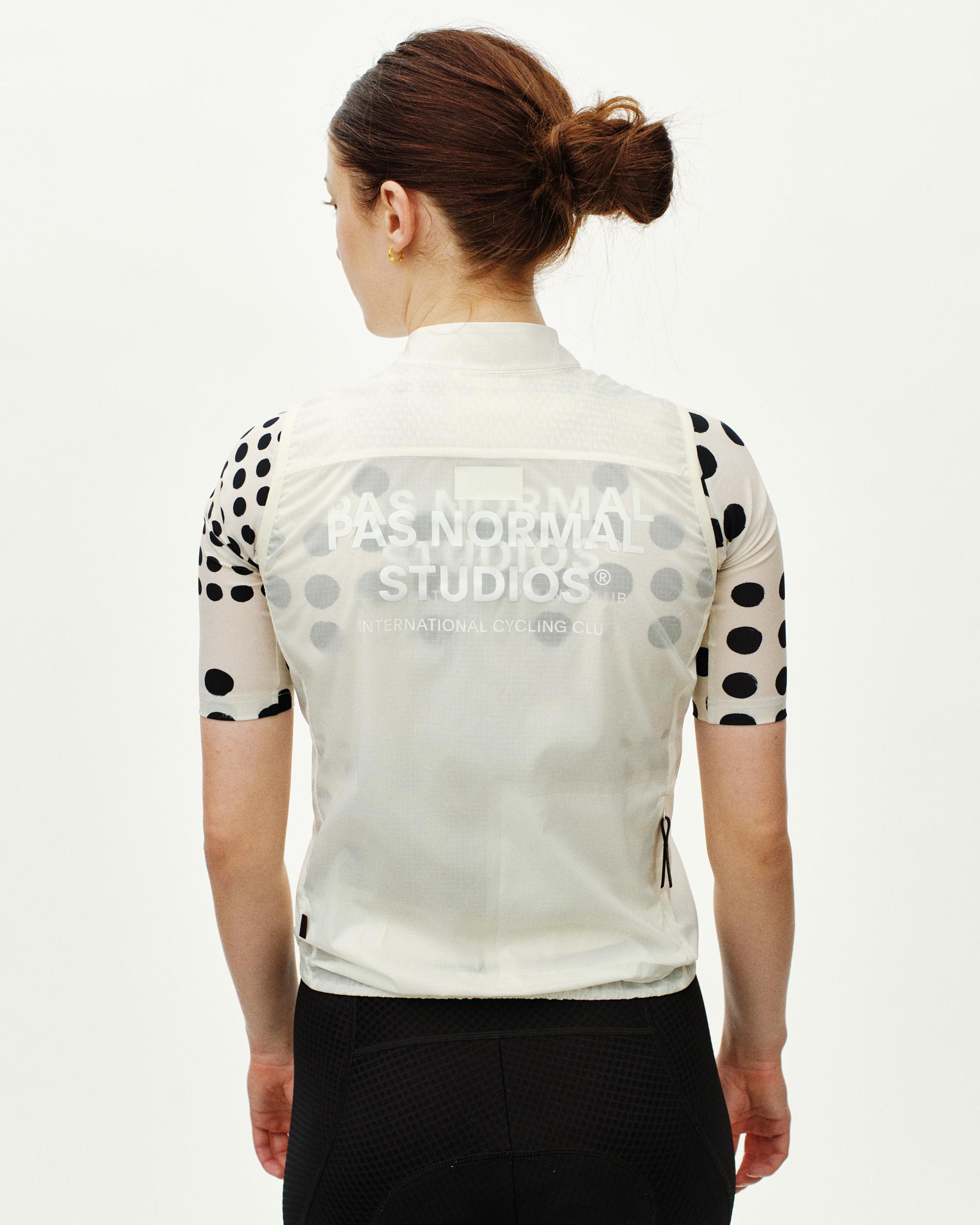Off White Essential cycling gilet on model, rear view with tonal back print
