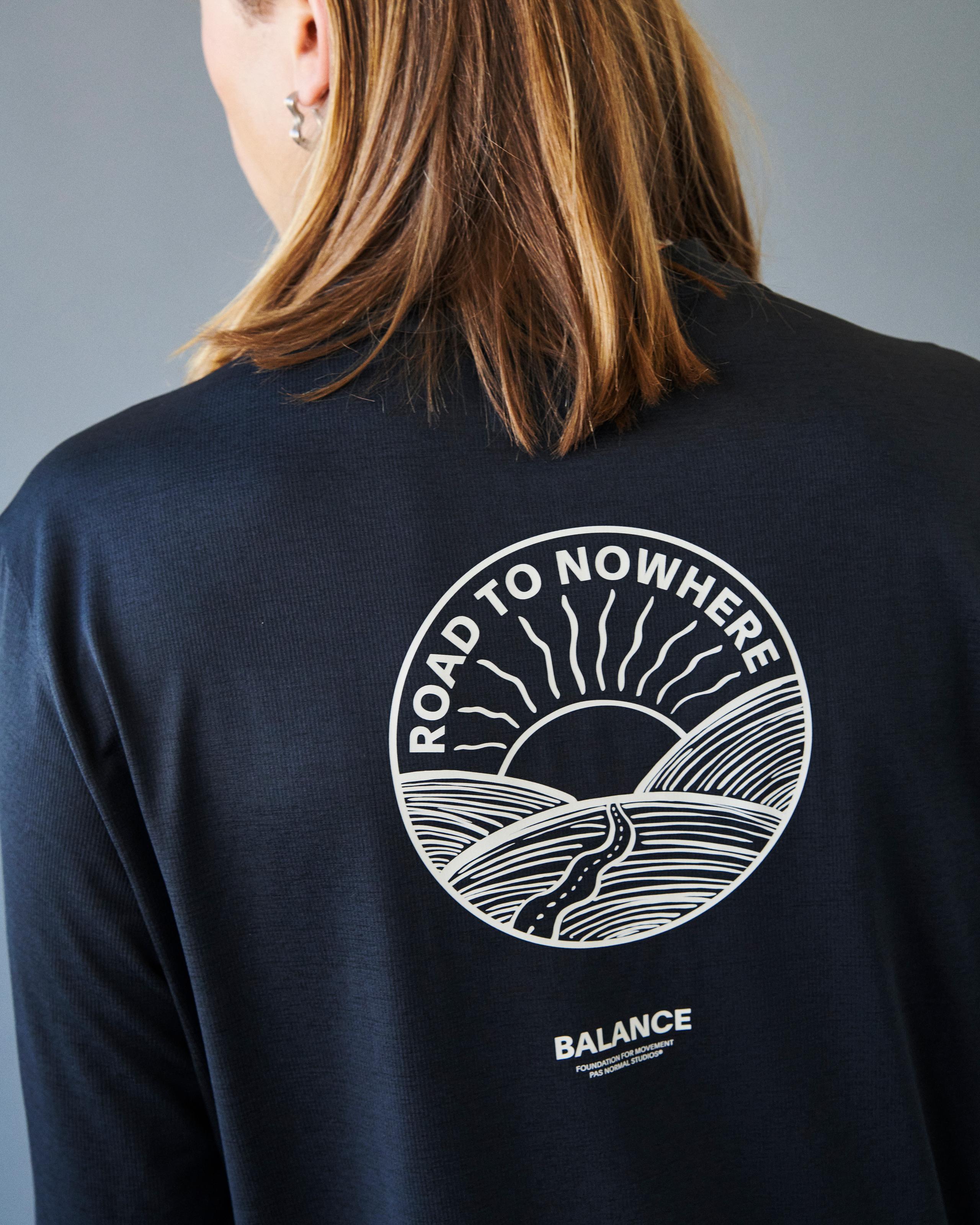 Navy Balance long sleeve t-shirt on model, rear view with white Road to Nowhere graphic