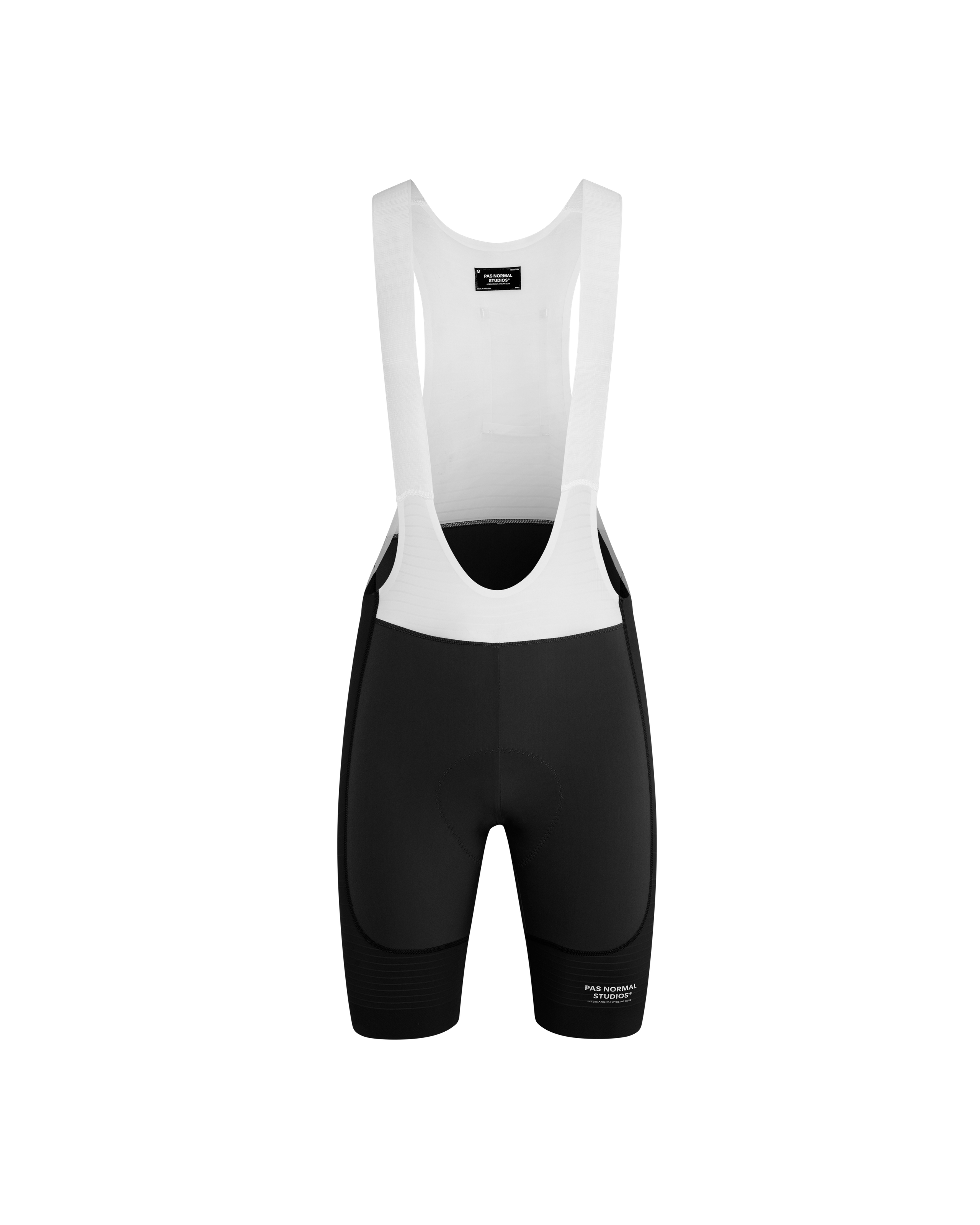 Black Mechanism Pro cycling bibs, front flat lay with white bib straps and black shorts