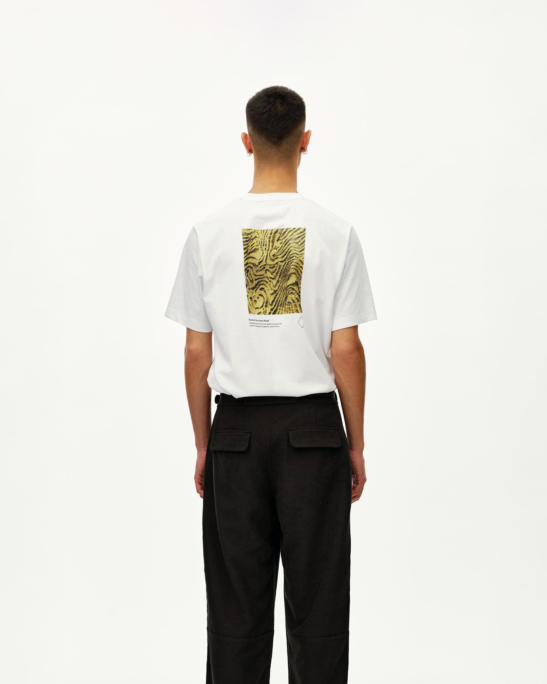 Black Off-Race Corduroy pants, rear view on model with patch pockets