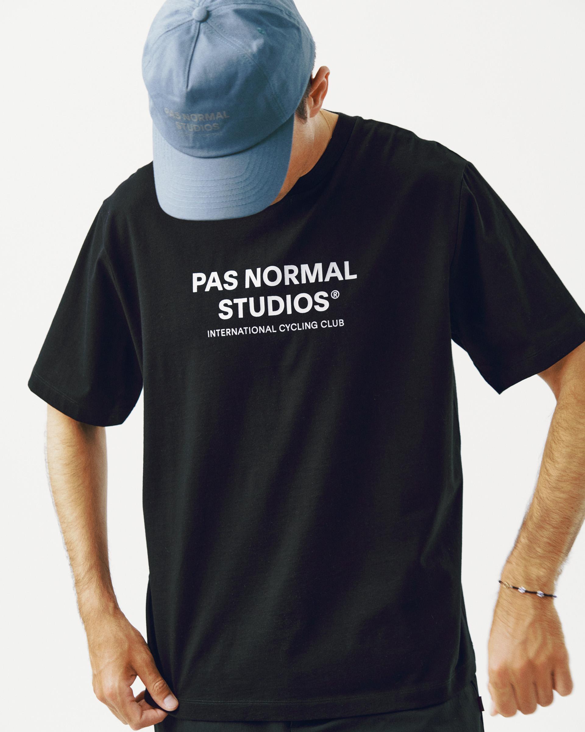 Black Off-Race Logo t-shirt on model, front view with white International Cycling Club chest print