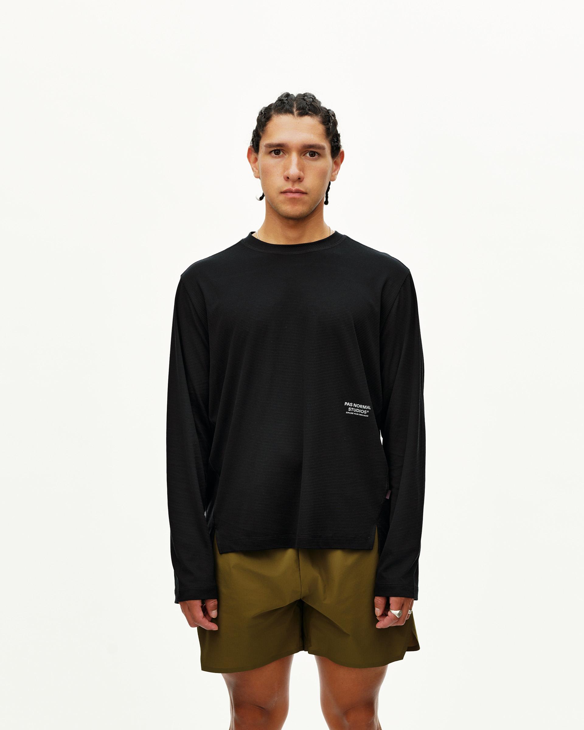 Black Balance Long Sleeve T-Shirt on model, front view with small chest logo print