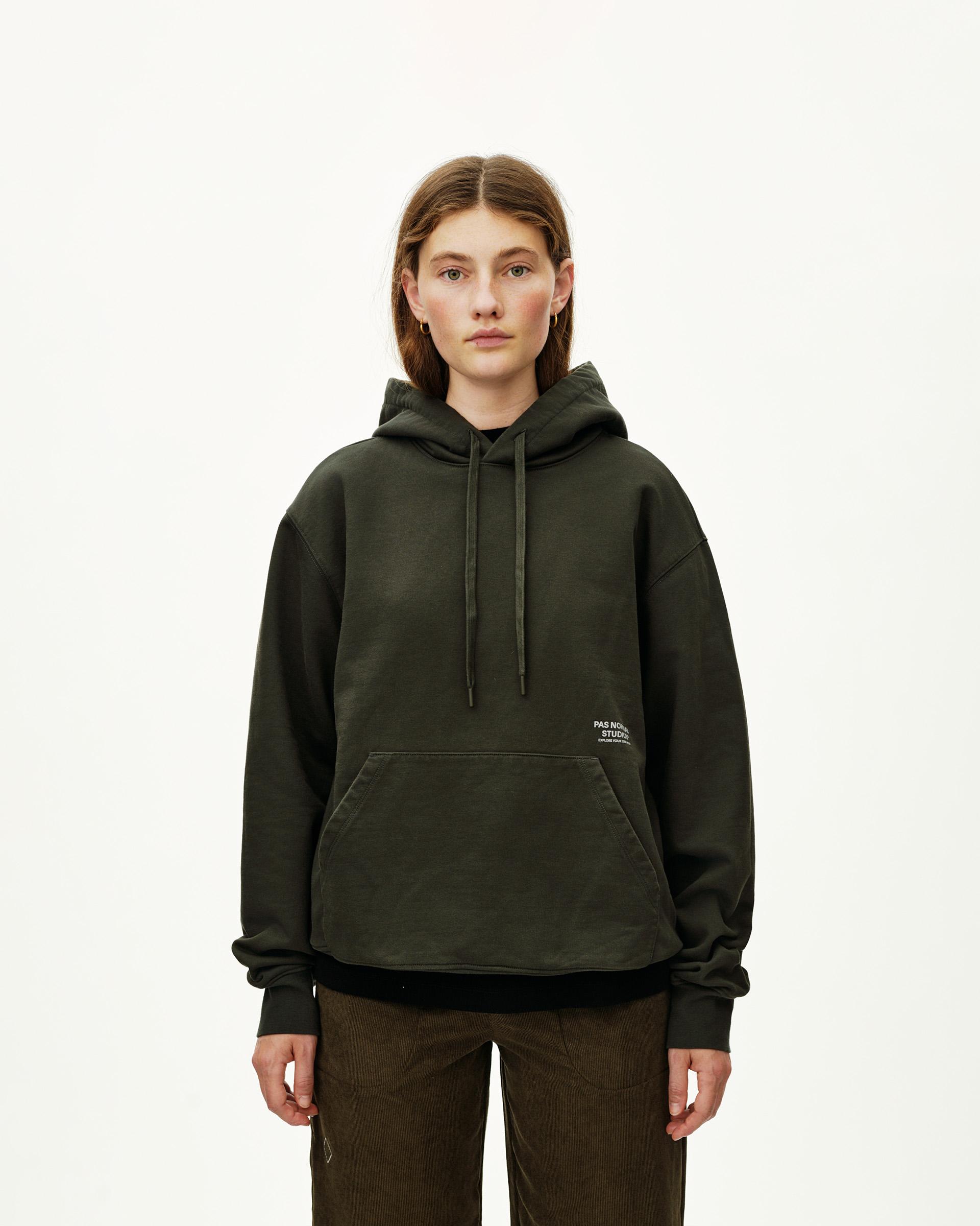 Dark Olive Off-Race hoodie on model, front view with kangaroo pocket and small chest text print