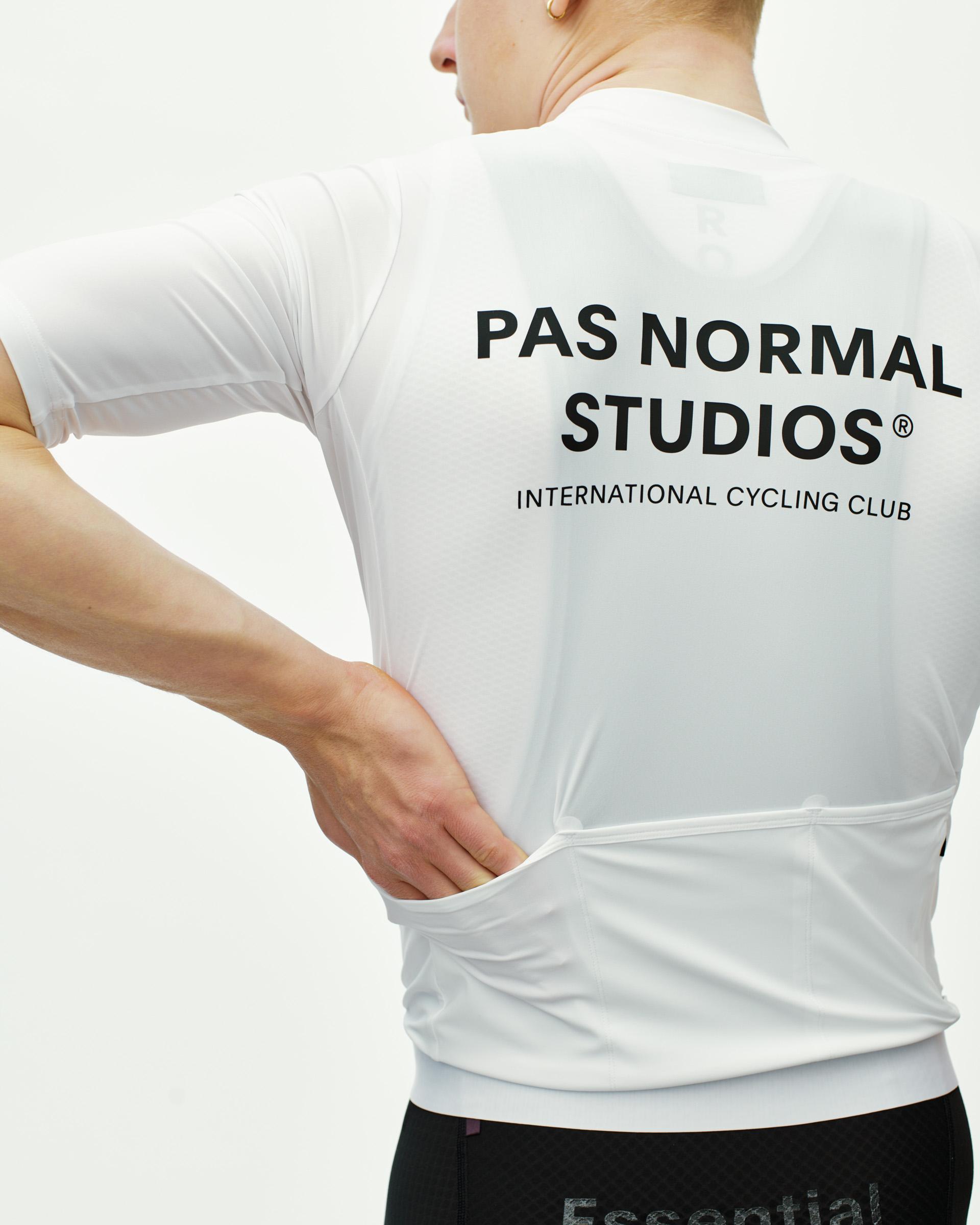 White Essential cycling jersey, rear view on model with black back print