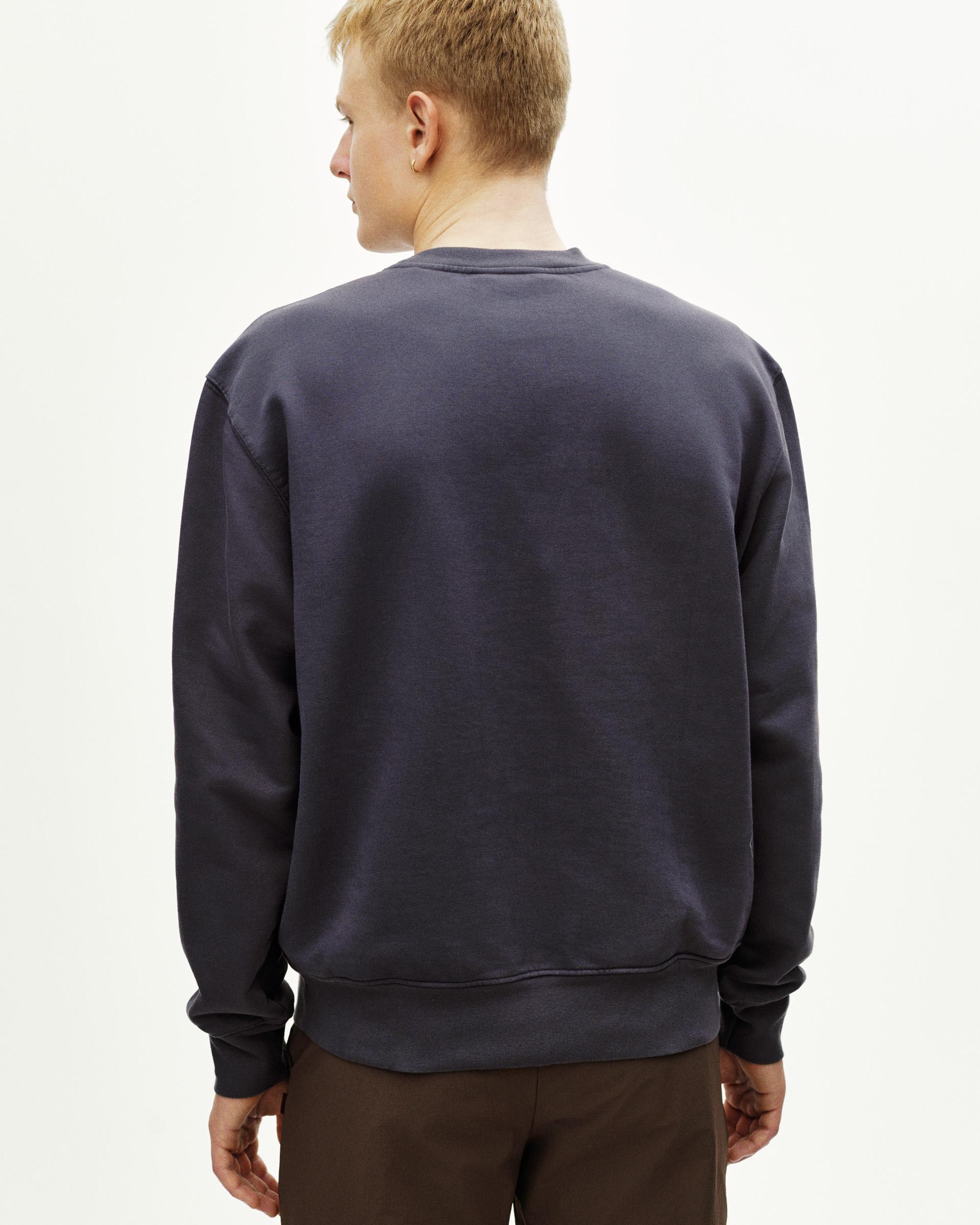 Grey Off-Race sweatshirt, rear view on model with ribbed cuffs and hem