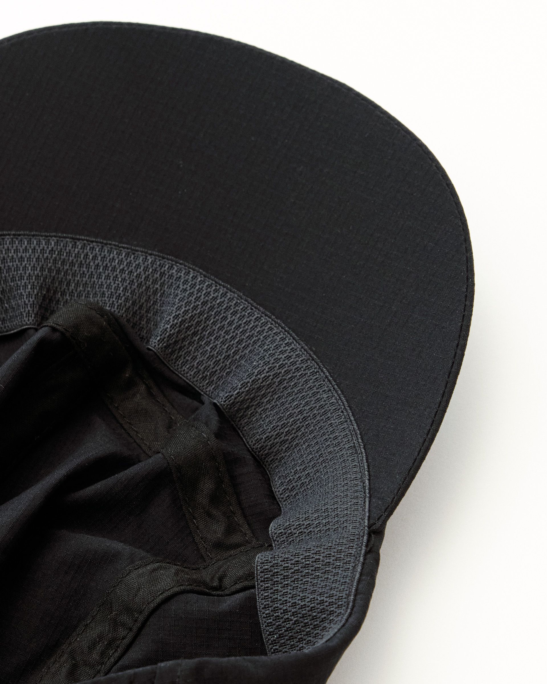 Elasticated sweatband inside cap brim for moisture-wicking and comfort during workouts