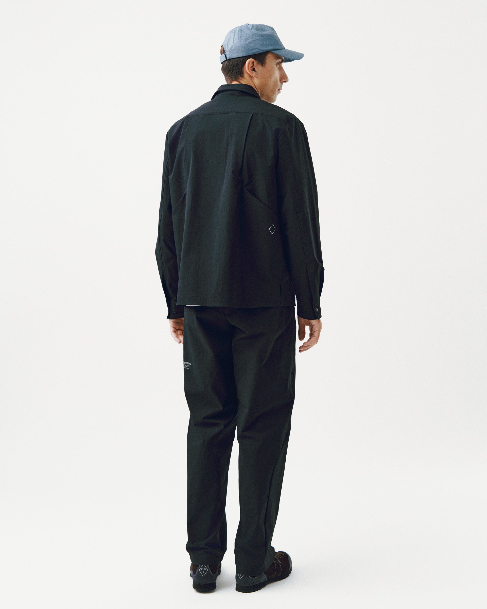 Black Off-Race Tech Overshirt, rear view on model with diamond logo detail