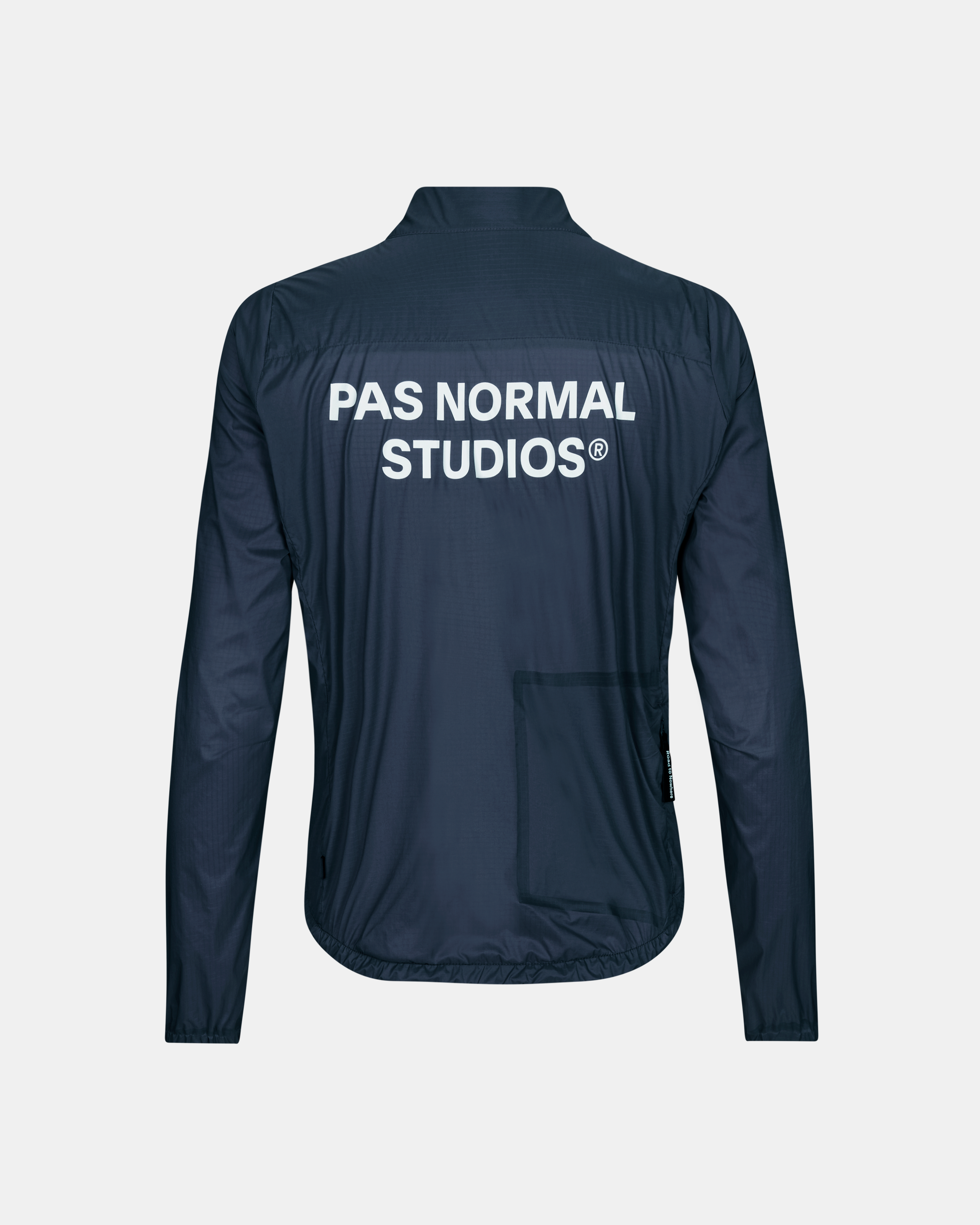 Navy Essential insulated cycling jacket, rear flat lay with white brand print