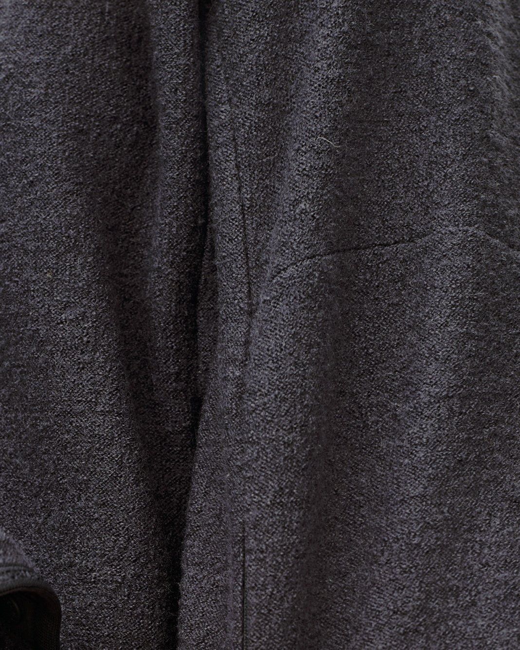 Dark Grey Off-Race Boiled Wool jacket, detail view of textured fabric and side seam