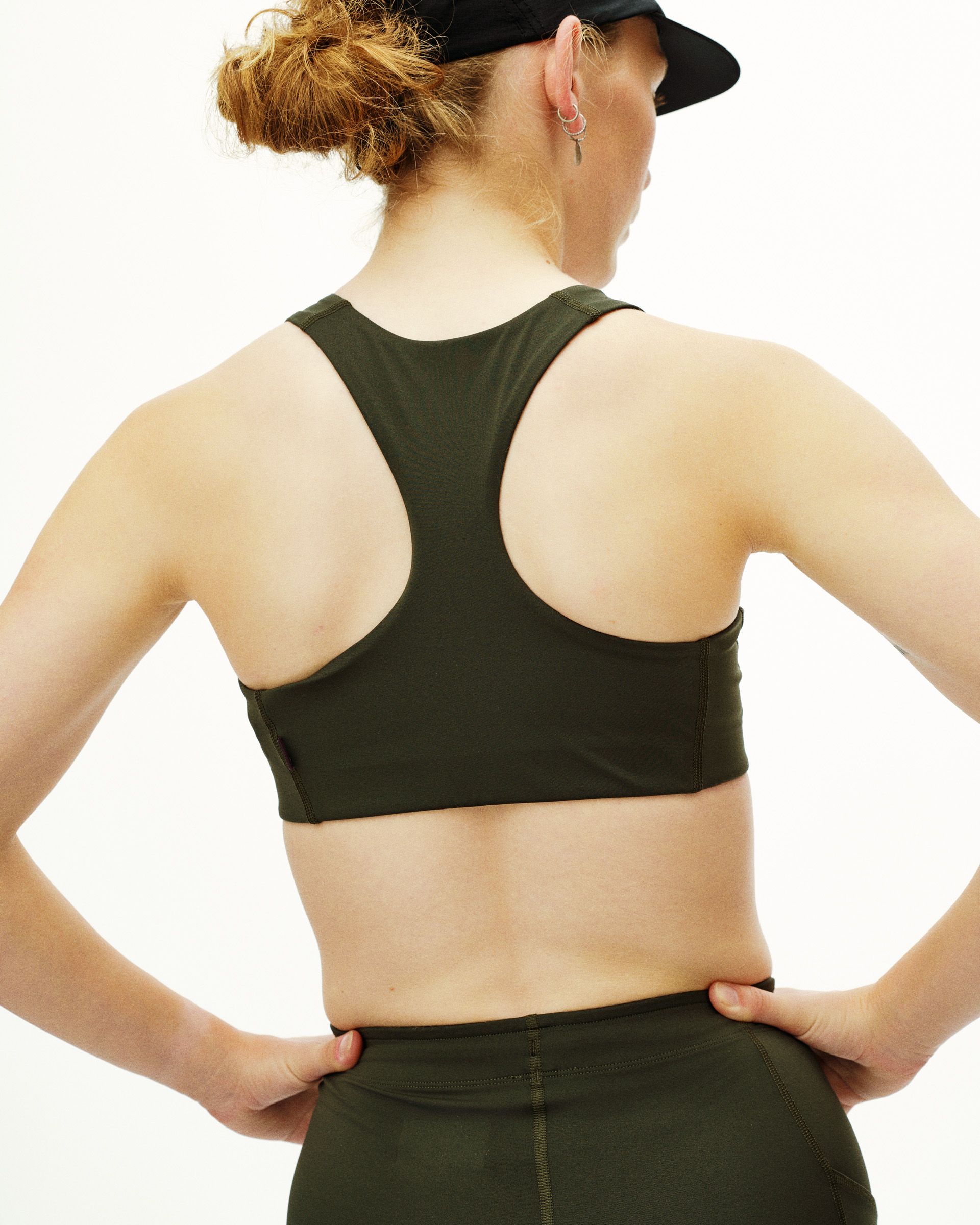 Dark Olive Balance bra on model, rear view with racerback design