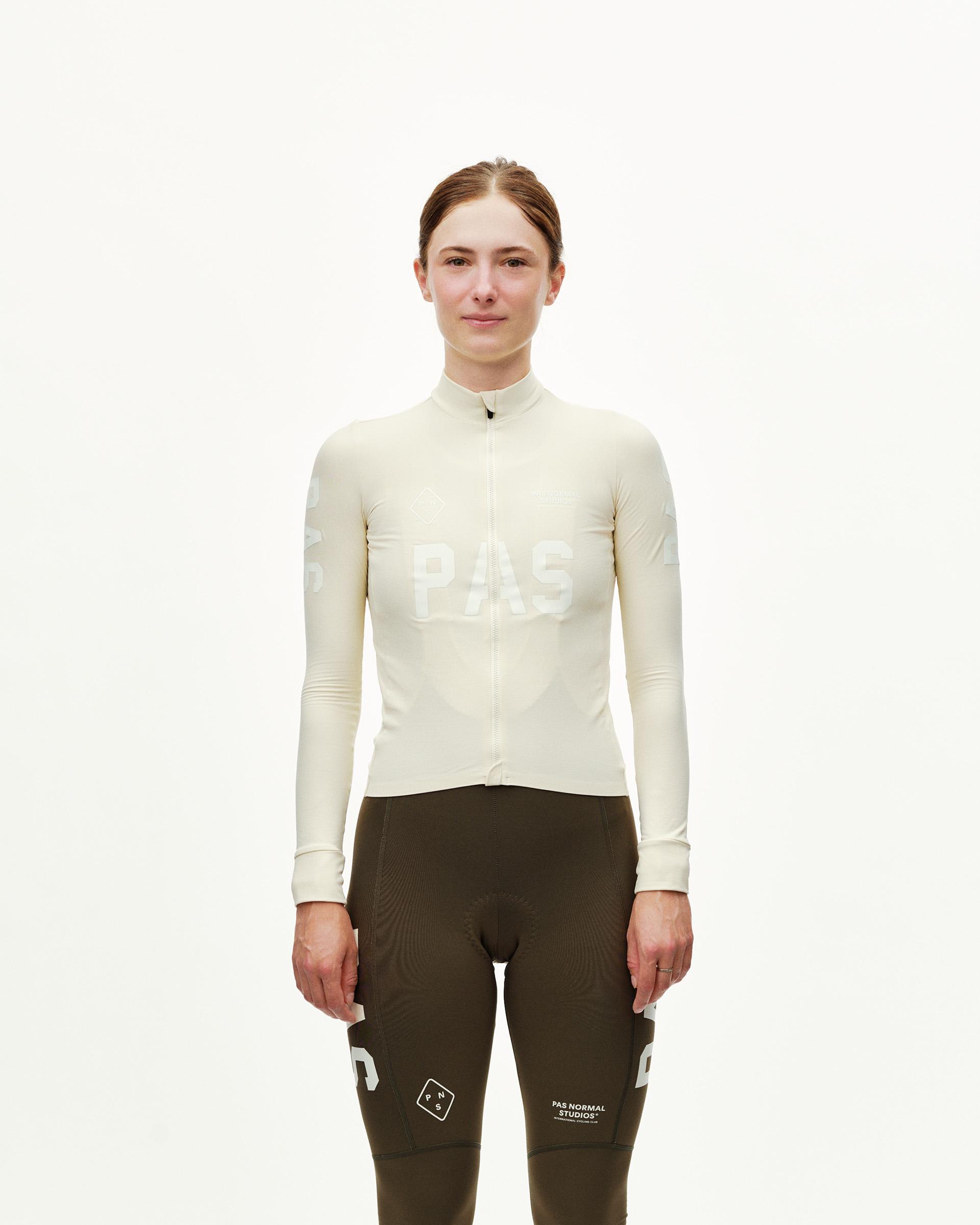 Sand PAS Mechanism women's long sleeve cycling jersey, front view on model with tone-on-tone chest print