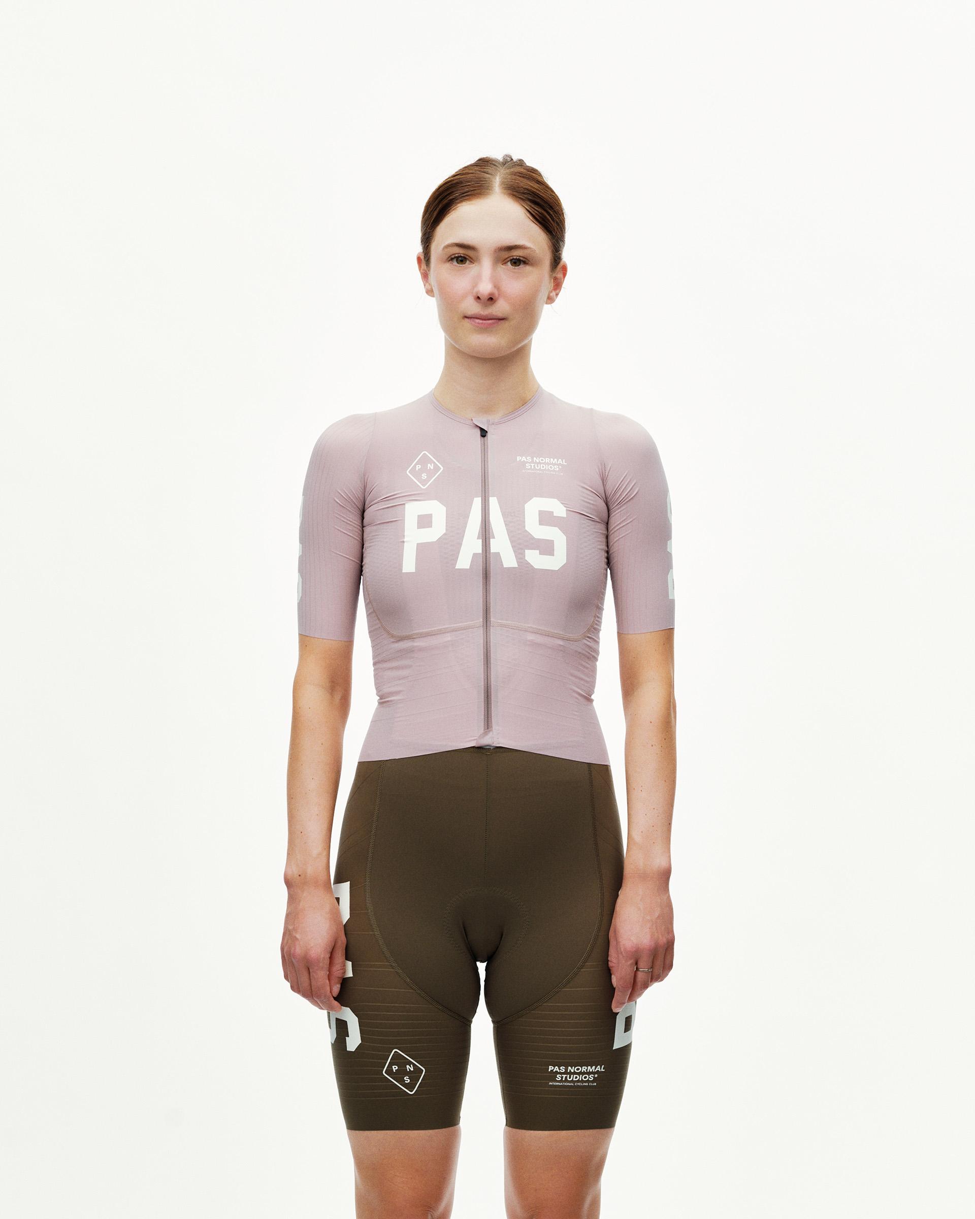 Taupe Rose PAS Mechanism Pro women's cycling jersey, front view on model with large white chest logo