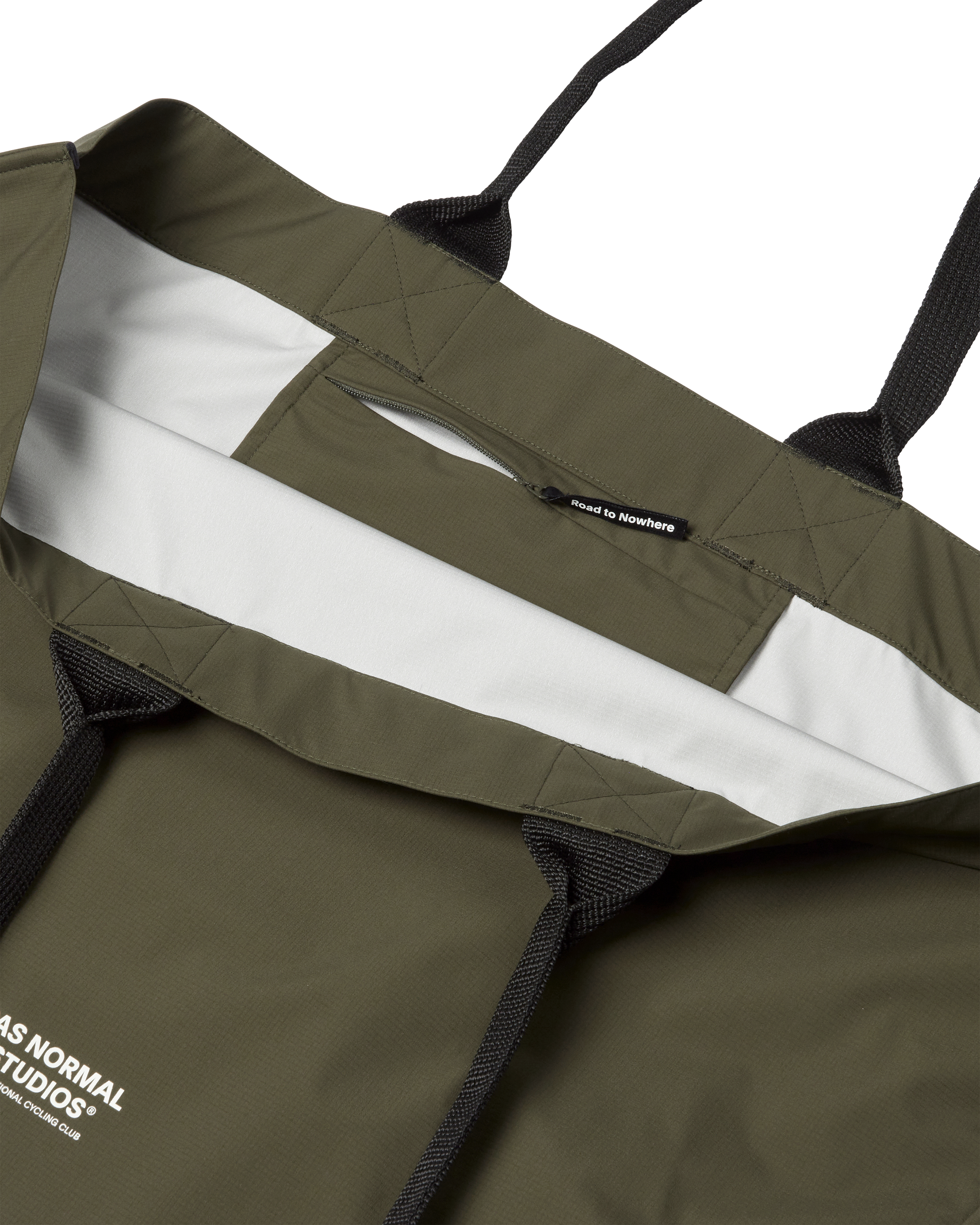 Olive Logo Shield tote bag, opened flat showing white branded liner and zip pocket