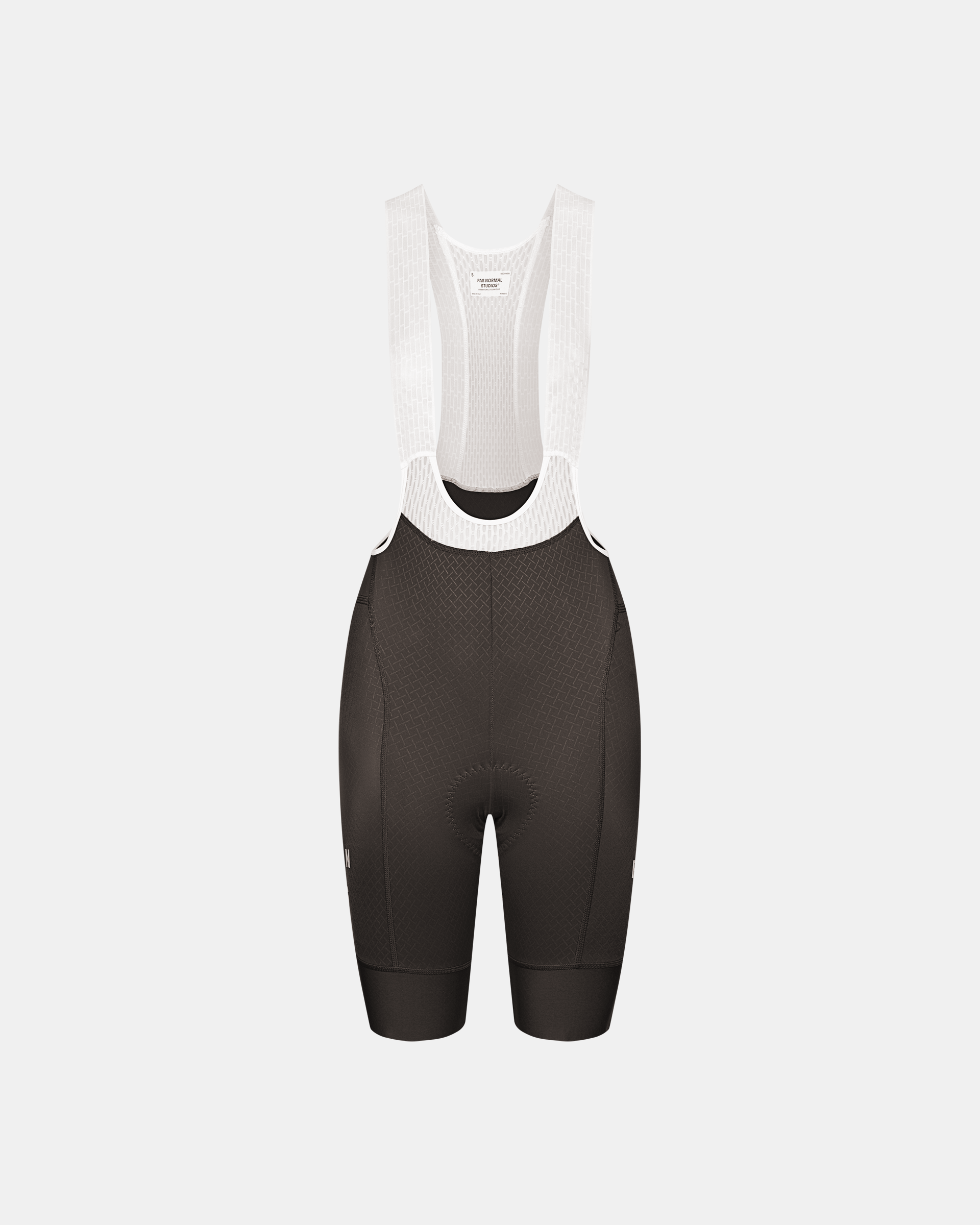 Dark Grey Mechanism cycling bibs, front flat lay with white ribbed bib straps