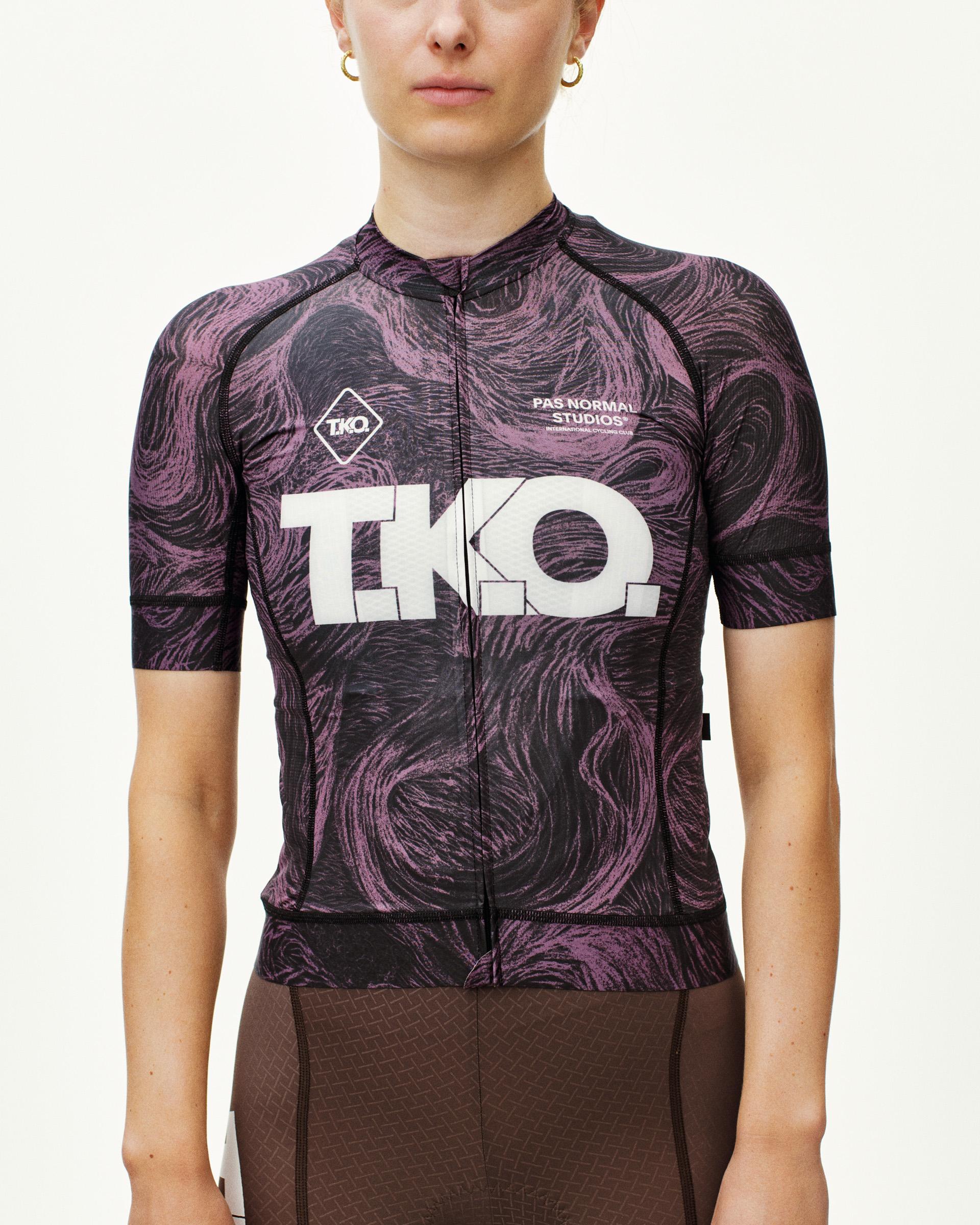 Mauve T.K.O. Mechanism cycling jersey on model, front view with swirl AOP and large chest logo