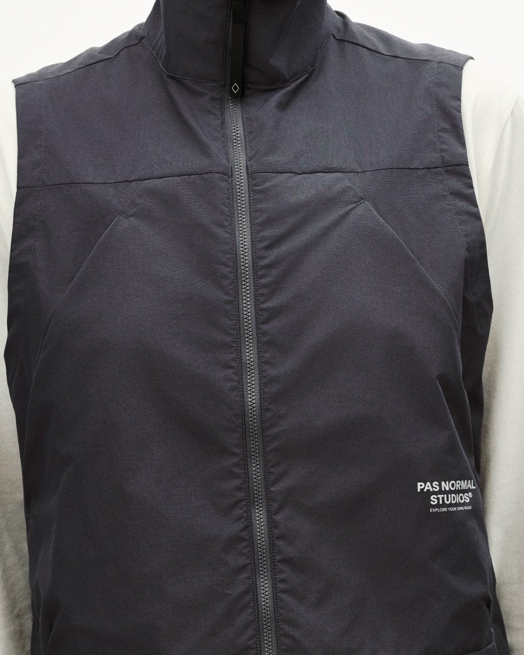 Grey Off-Race Utility vest, front view with full zip and chest panel construction