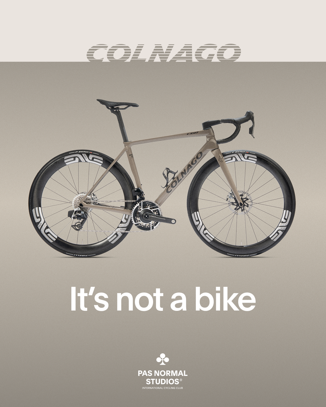 Colnago road bike in beige with deep carbon wheels and aerodynamic frame design