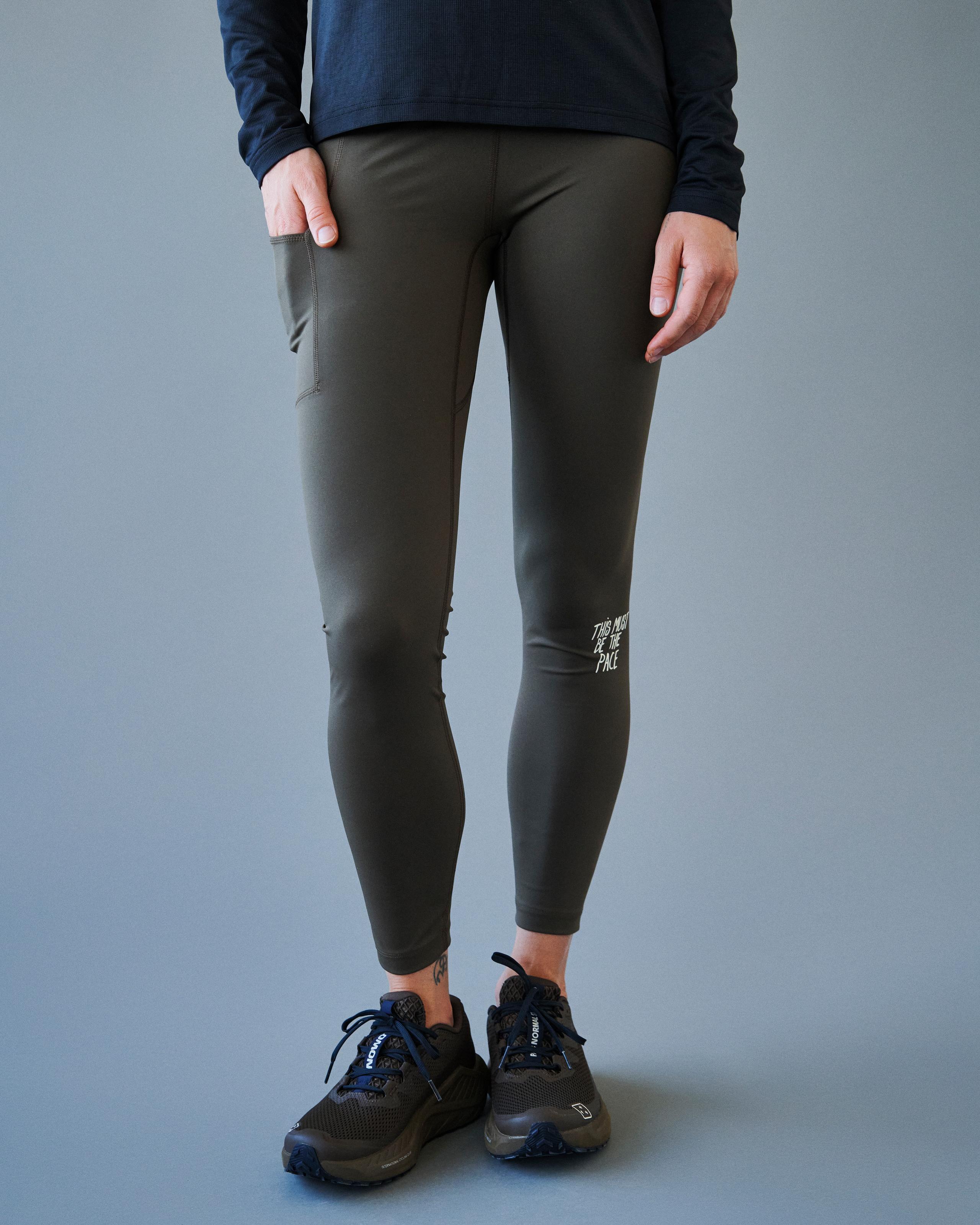 Brown Balance long tights on model with white leg print