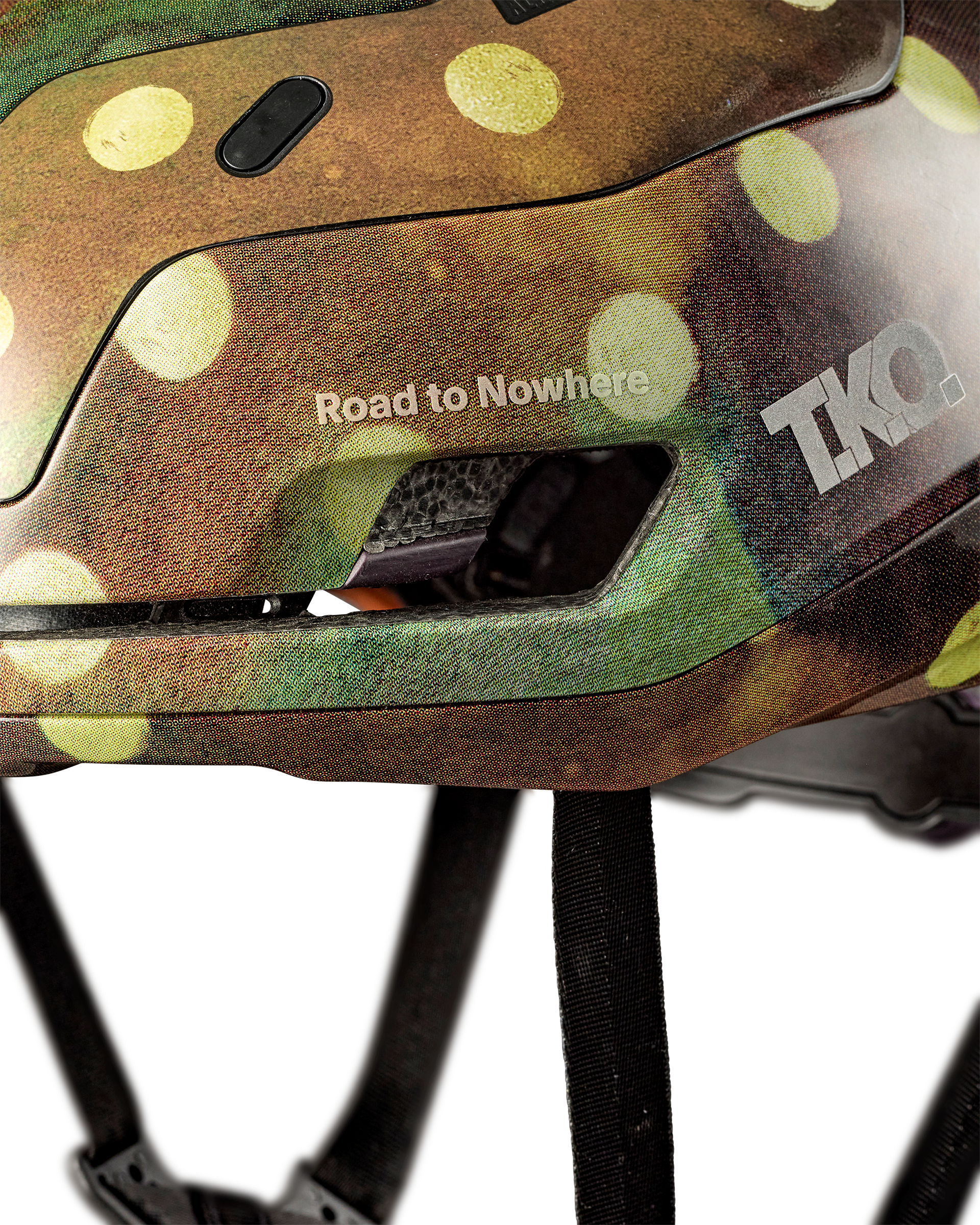 Brown T.K.O. Falconer Aero 2Vi cycling helmet, side view with polka dot pattern and Road to Nowhere text