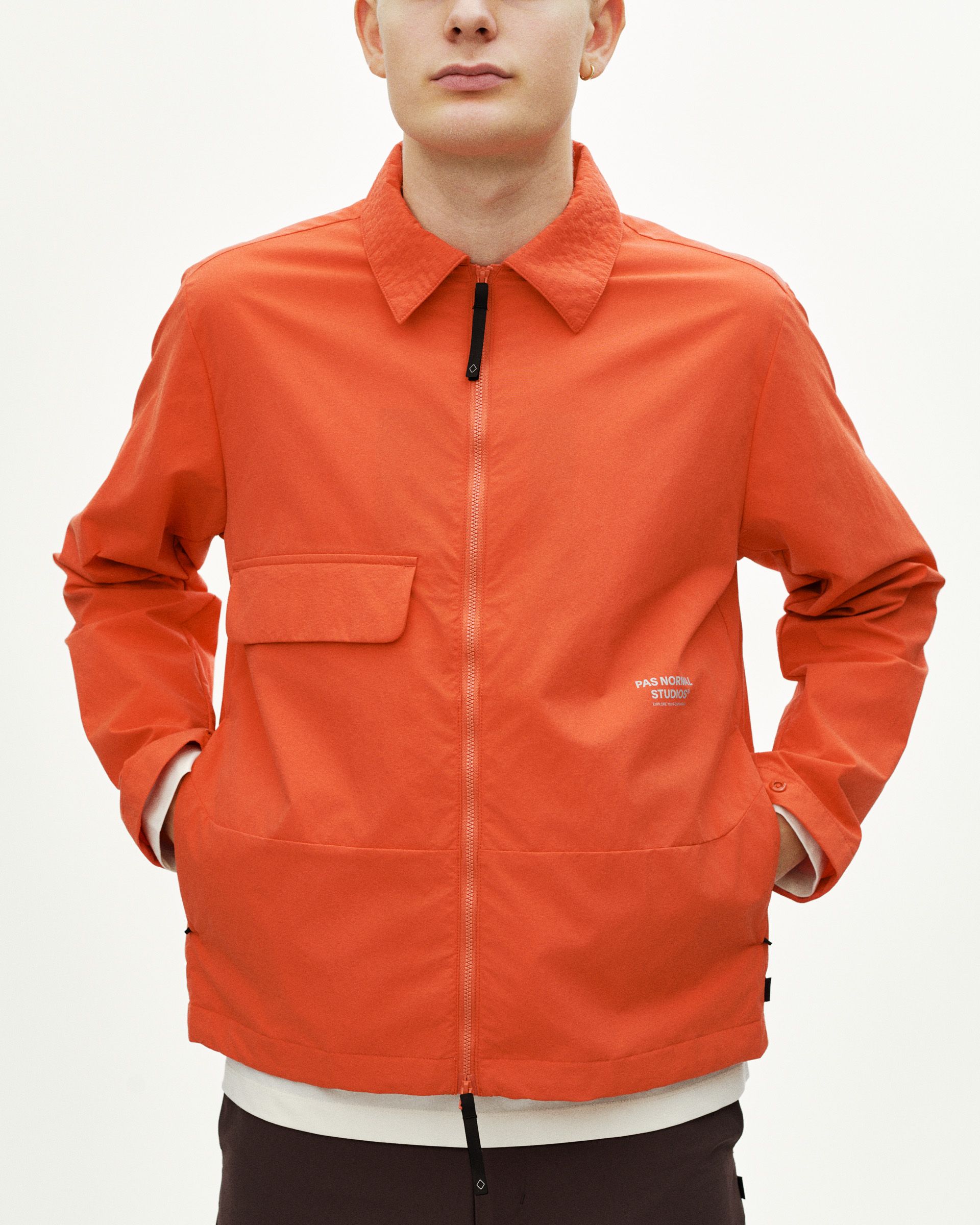 Orange Off-Race Utility jacket on model with front zip and chest pocket