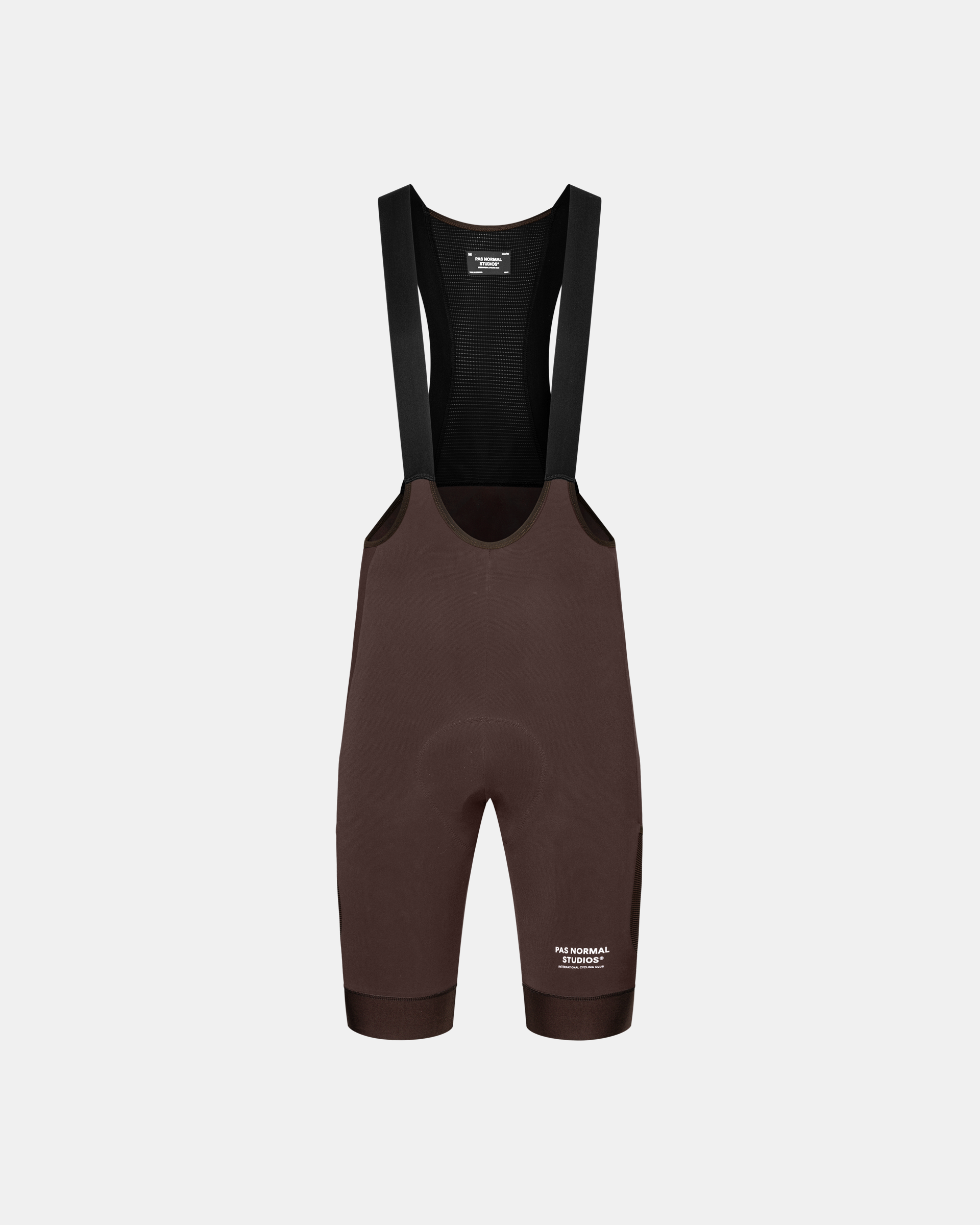 Dark Red Escapism Cargo cycling bibs, front flat lay with black mesh bib straps