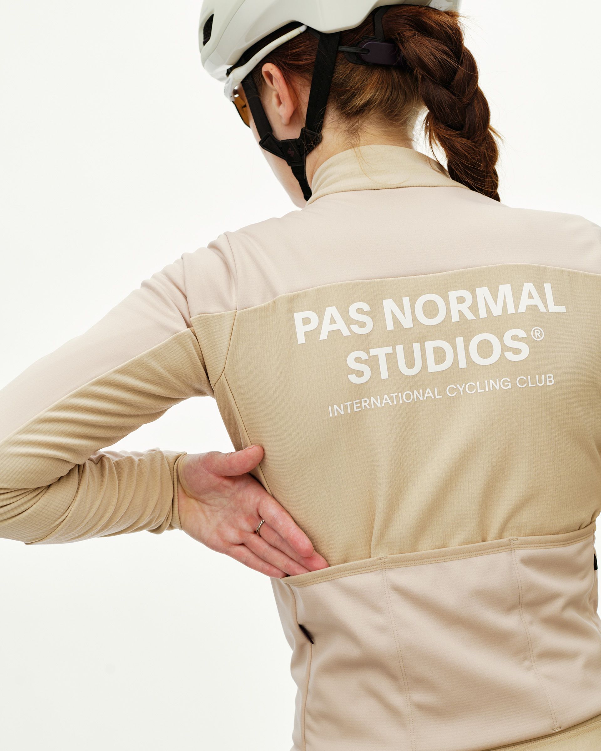 Linen Mechanism Thermal Long Sleeve cycling jersey on model, rear view with white back print