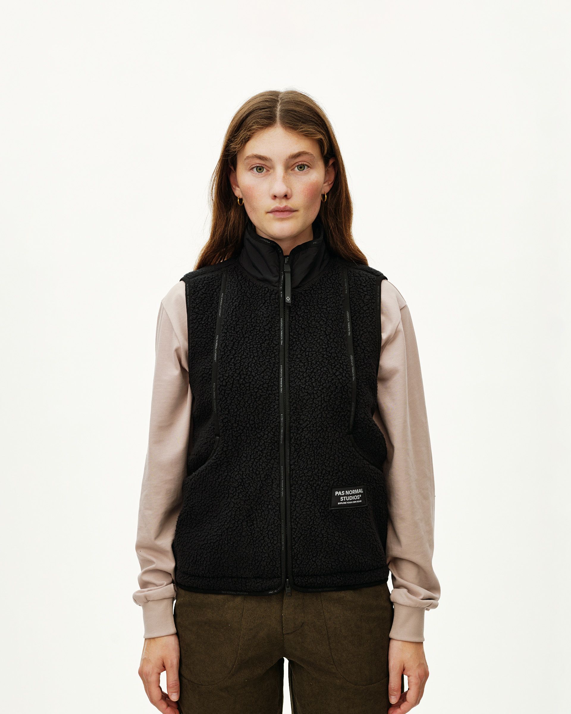 Black Off-Race Pile Fleece vest on model, front view with full zip and sherpa texture