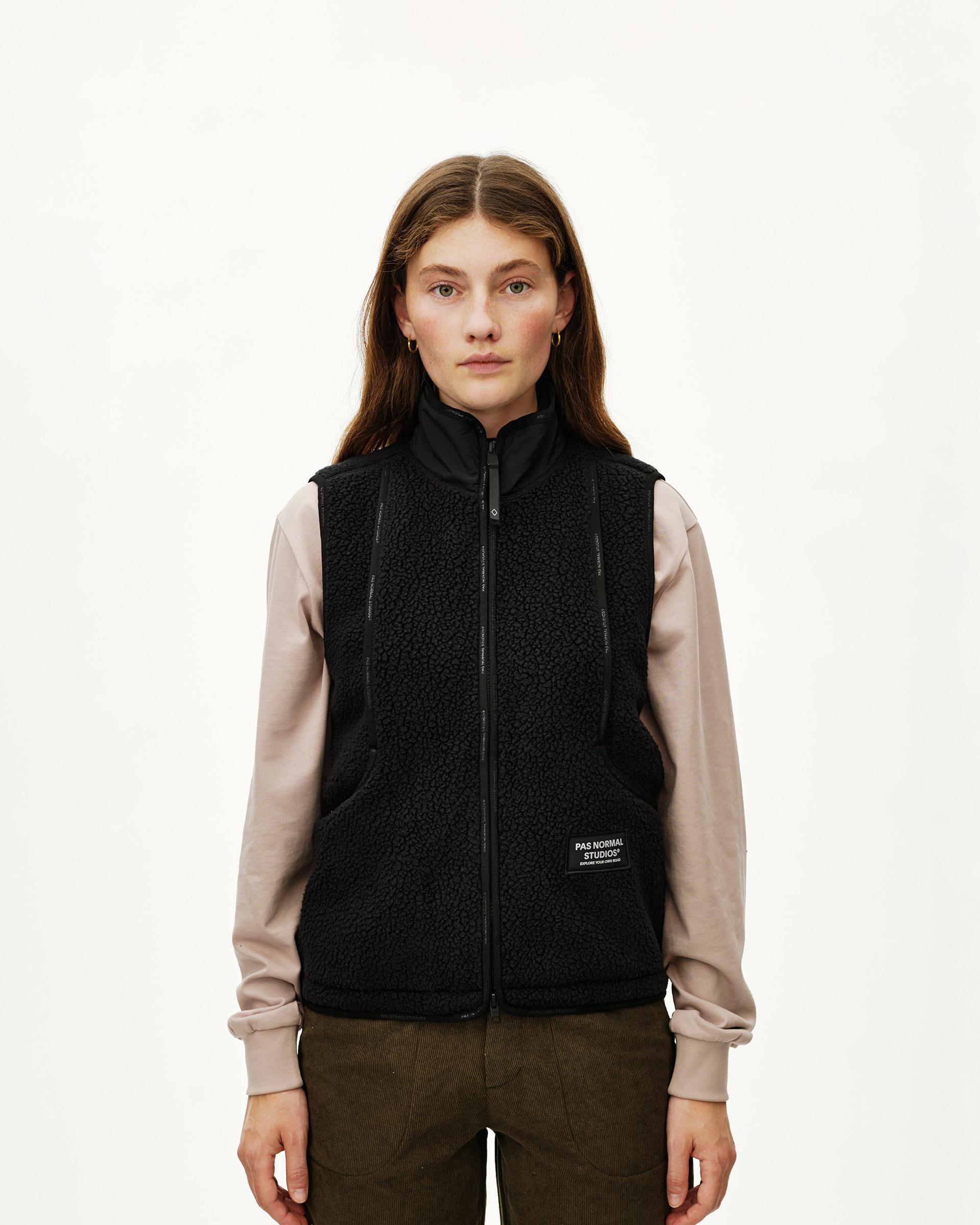 Black Off-Race Pile Fleece vest on model, front view with full zip and sherpa texture